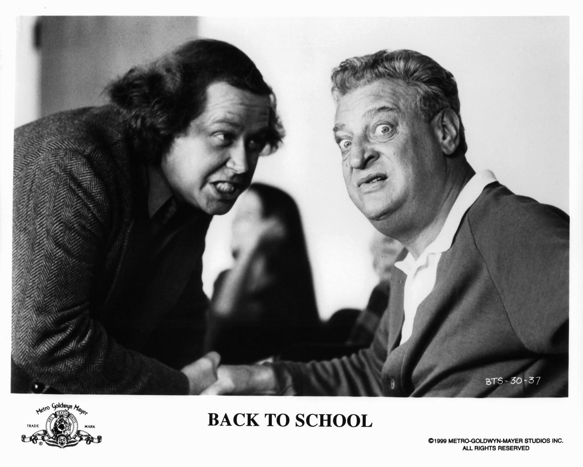 Sam Kinison and Rodney Dangerfield in Back to School