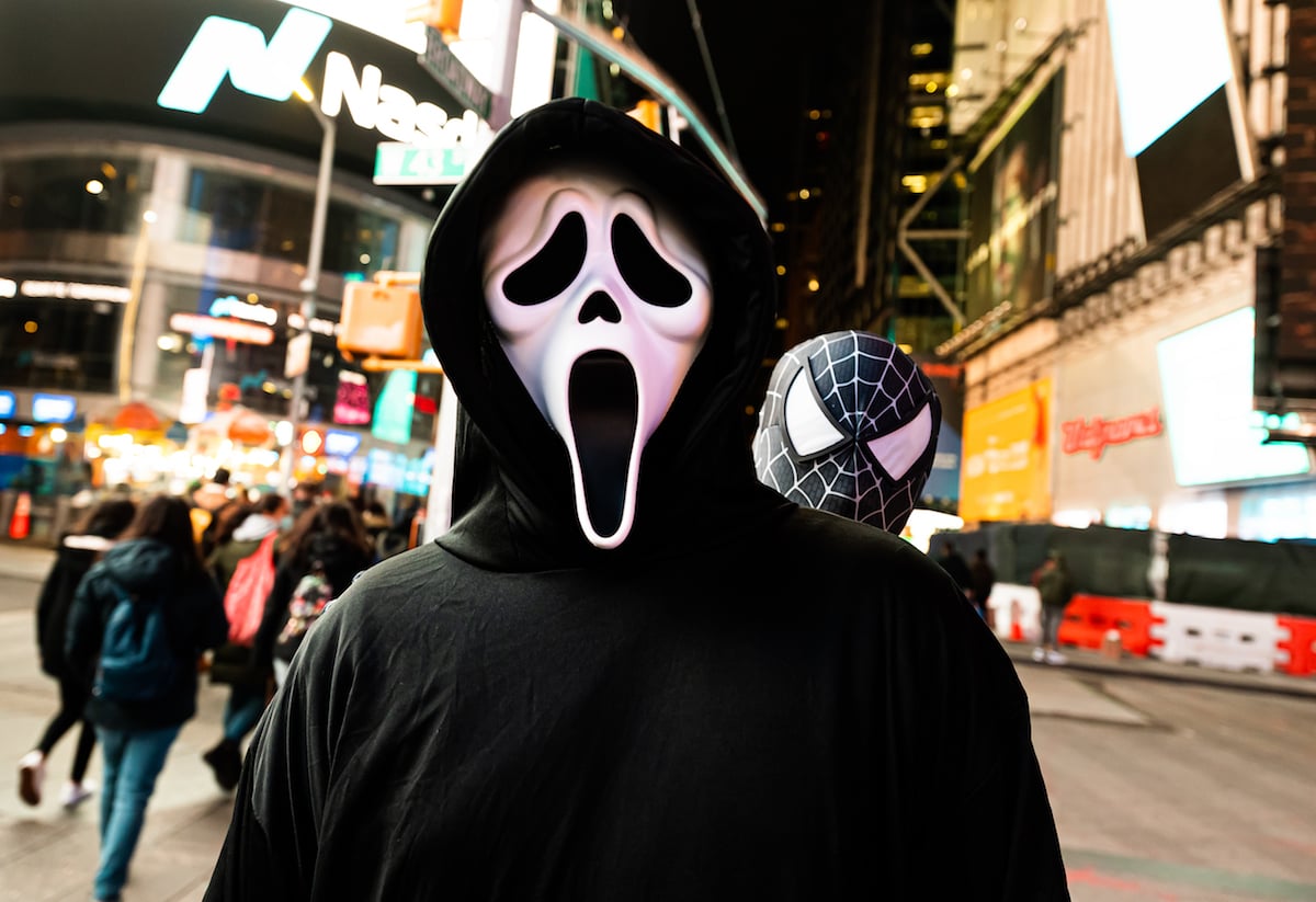A person wears a Ghostface costume from the movie 'Scream' in Times Square on October 31, 2020 in New York City. 