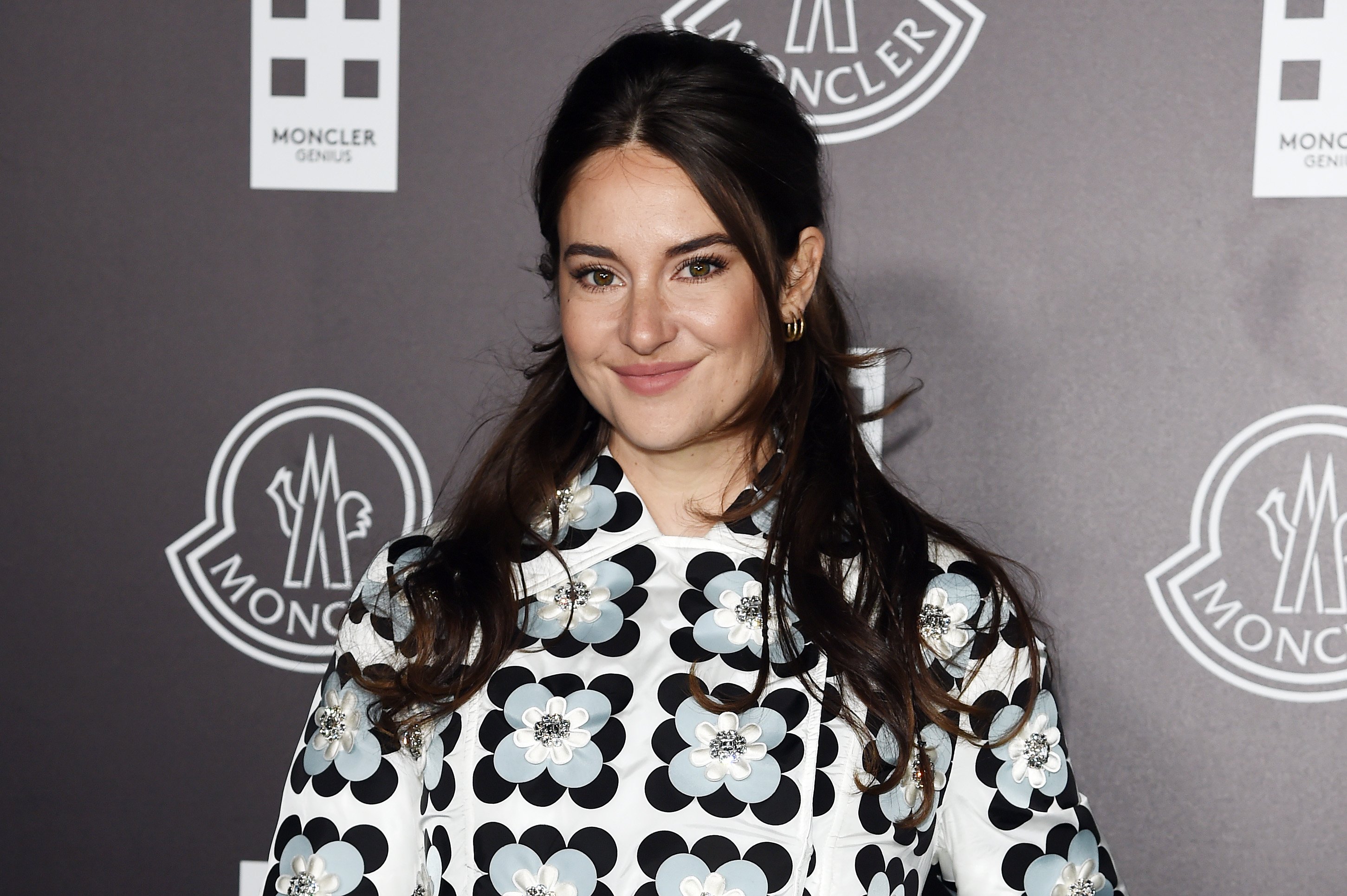 Shailene Woodley wears a printed flower shift dress in Milan