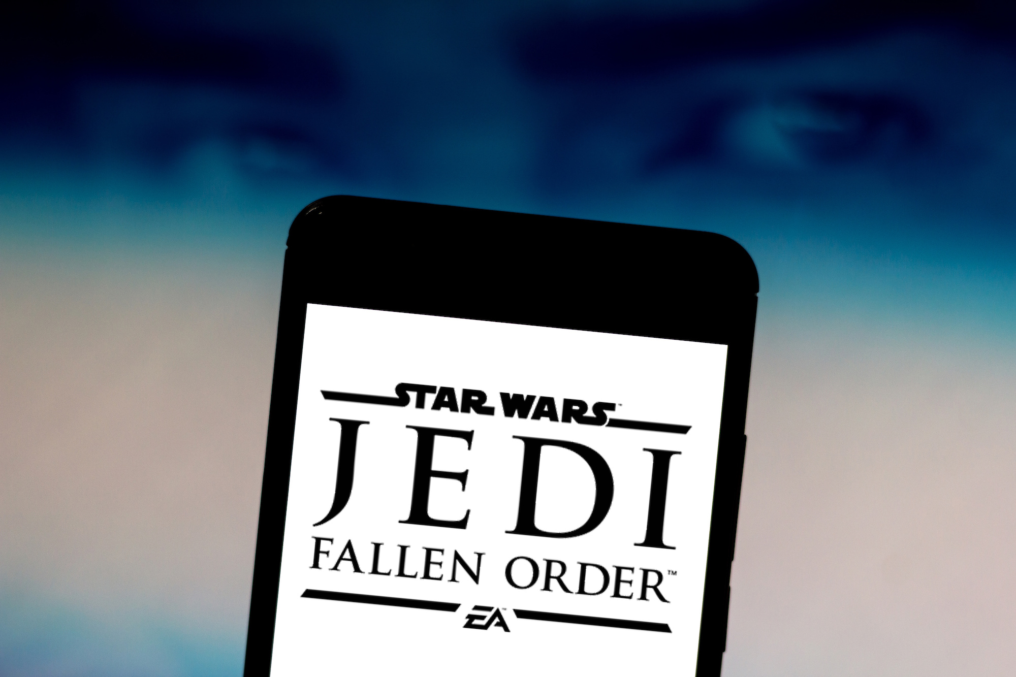 In this photo illustration the Star Wars Jedi: Fallen Order logo is seen displayed on a smartphone