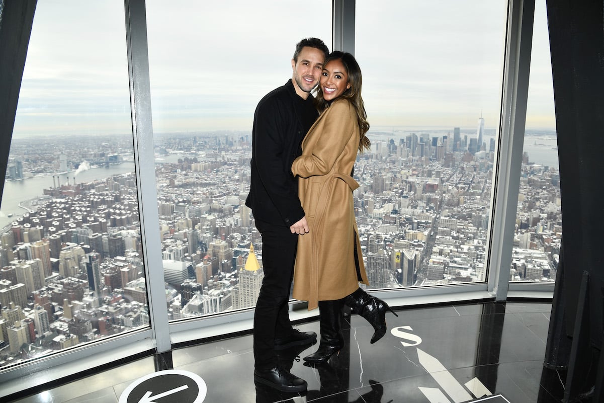 Tayshia Adams and Zac Clark from 'The Bachelorette' hug at the Empire State Building