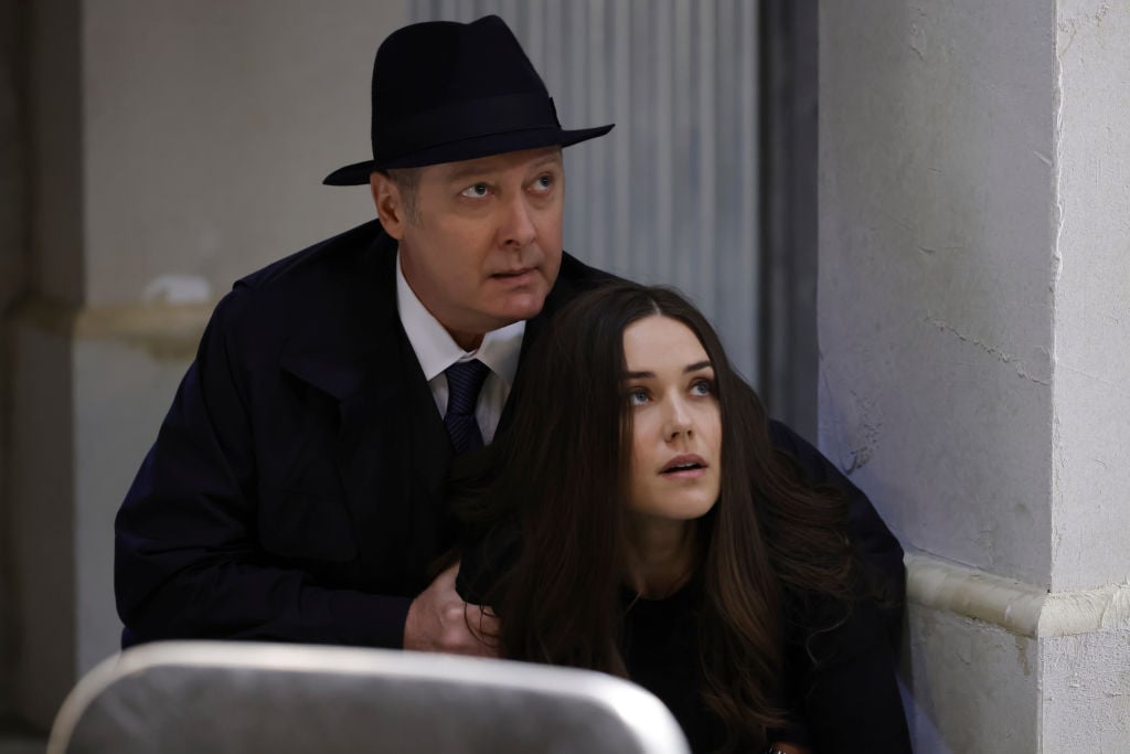 James Spader as Raymond 'Red' Reddington, Megan Boone as Liz Keen duck and hide from danger.