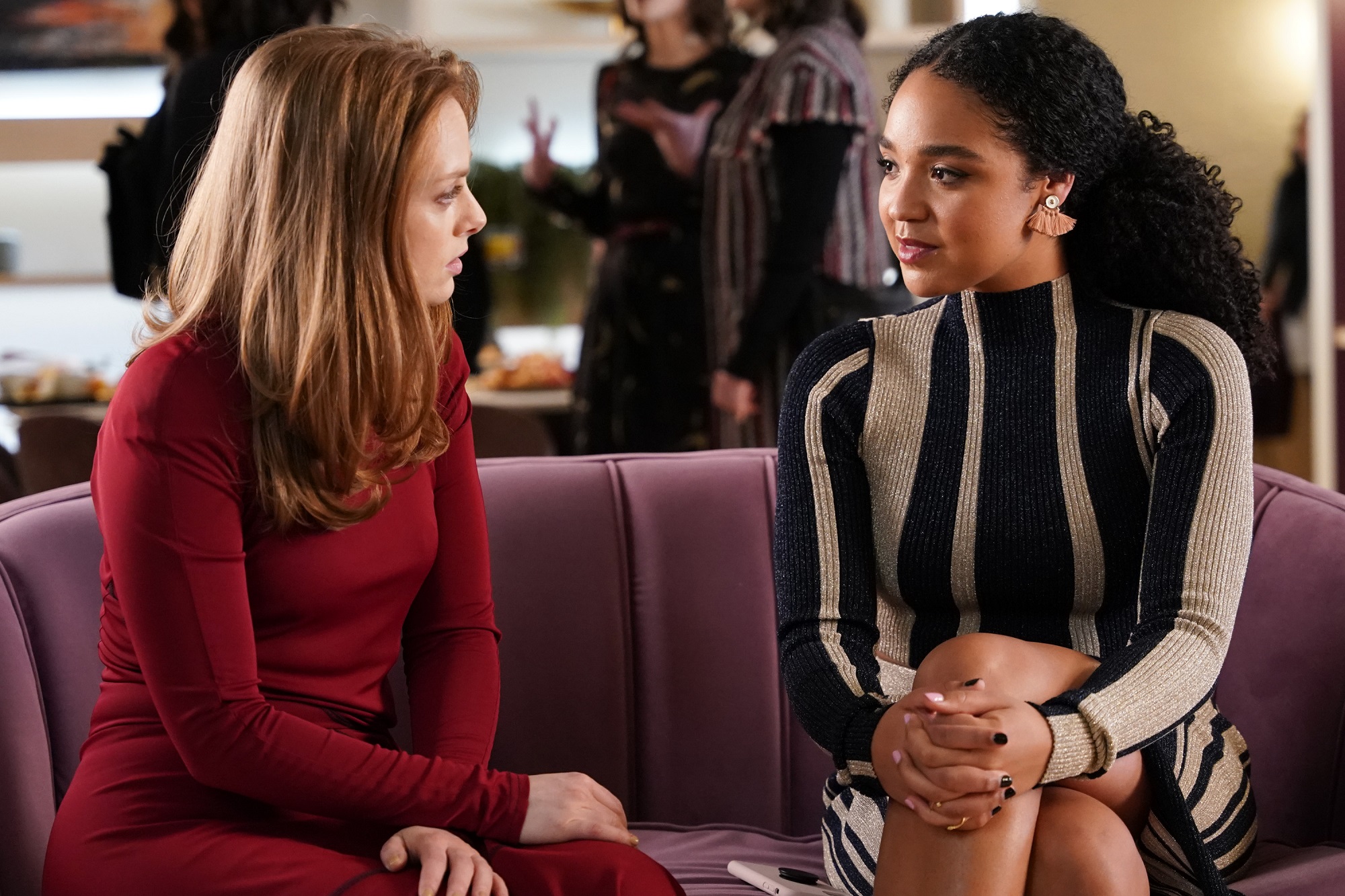 Eva and Kat sit on a couch together in season 4 of 'The Bold Type'