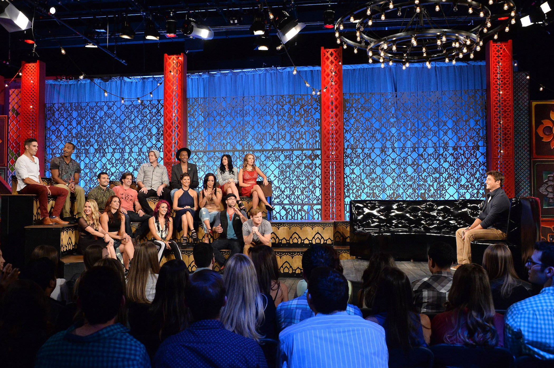 A distant photo of the cast from 'The Challenge' sitting together at MTV's 'The Challenge: Rivals II' final episode and reunion party