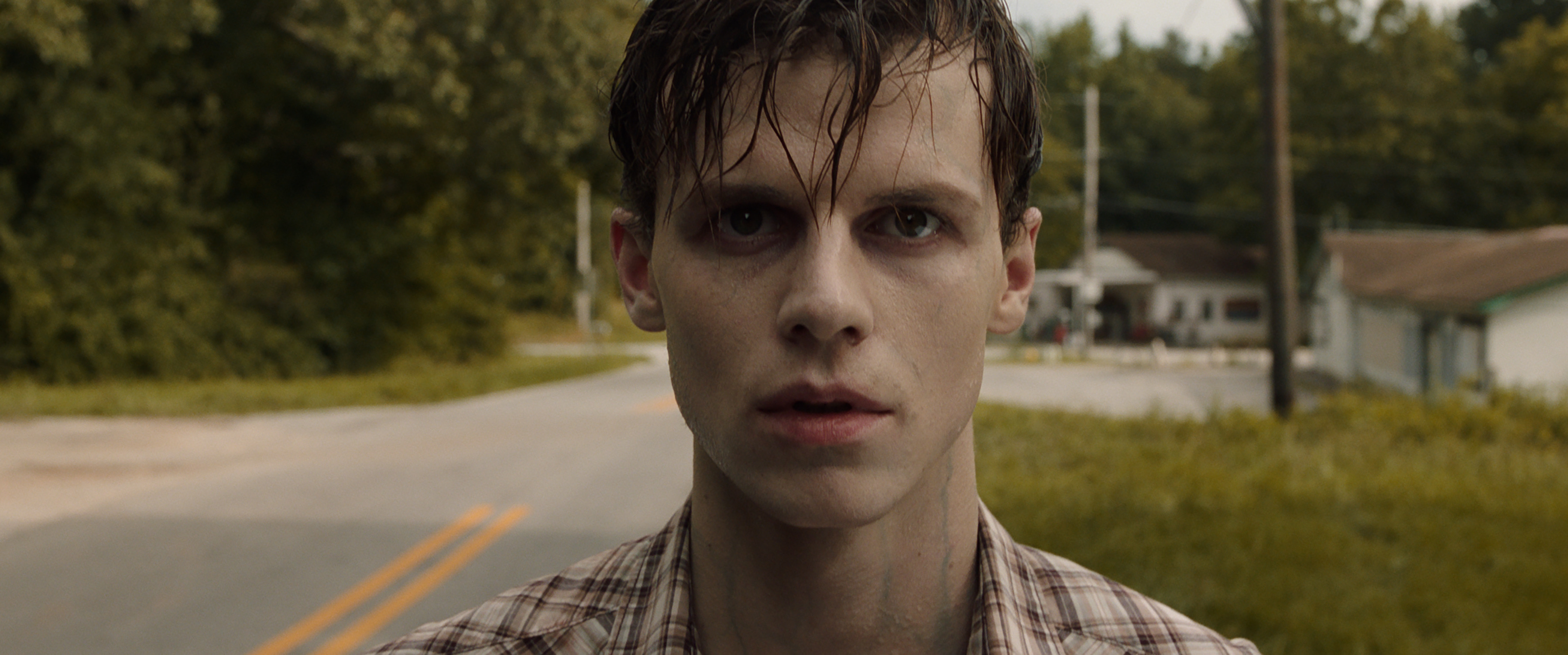 The Devil Made Me Do It star Ruairi O'Connor walks down the street