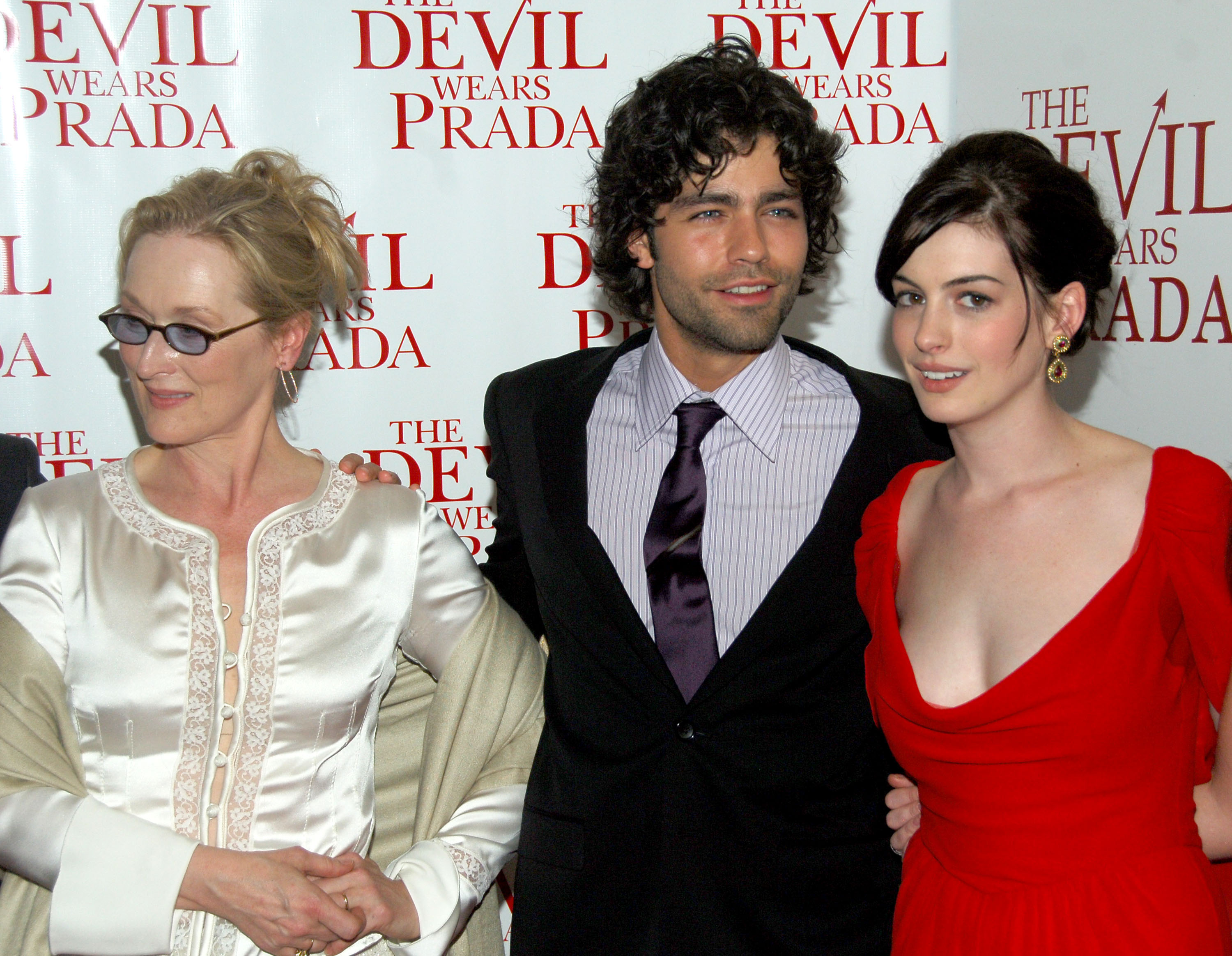 'The Devil Wears Prada' cast members Meryl Streep, Adrian Grenier, and Anne Hathaway at the movie's premiere.