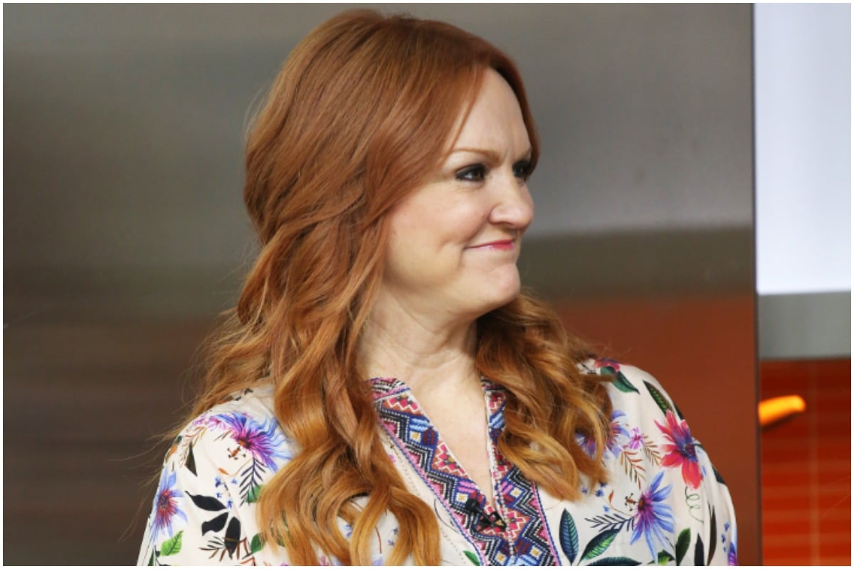 'The Pioneer Woman' star Ree Drummond smirking in a floral top while filming the show.