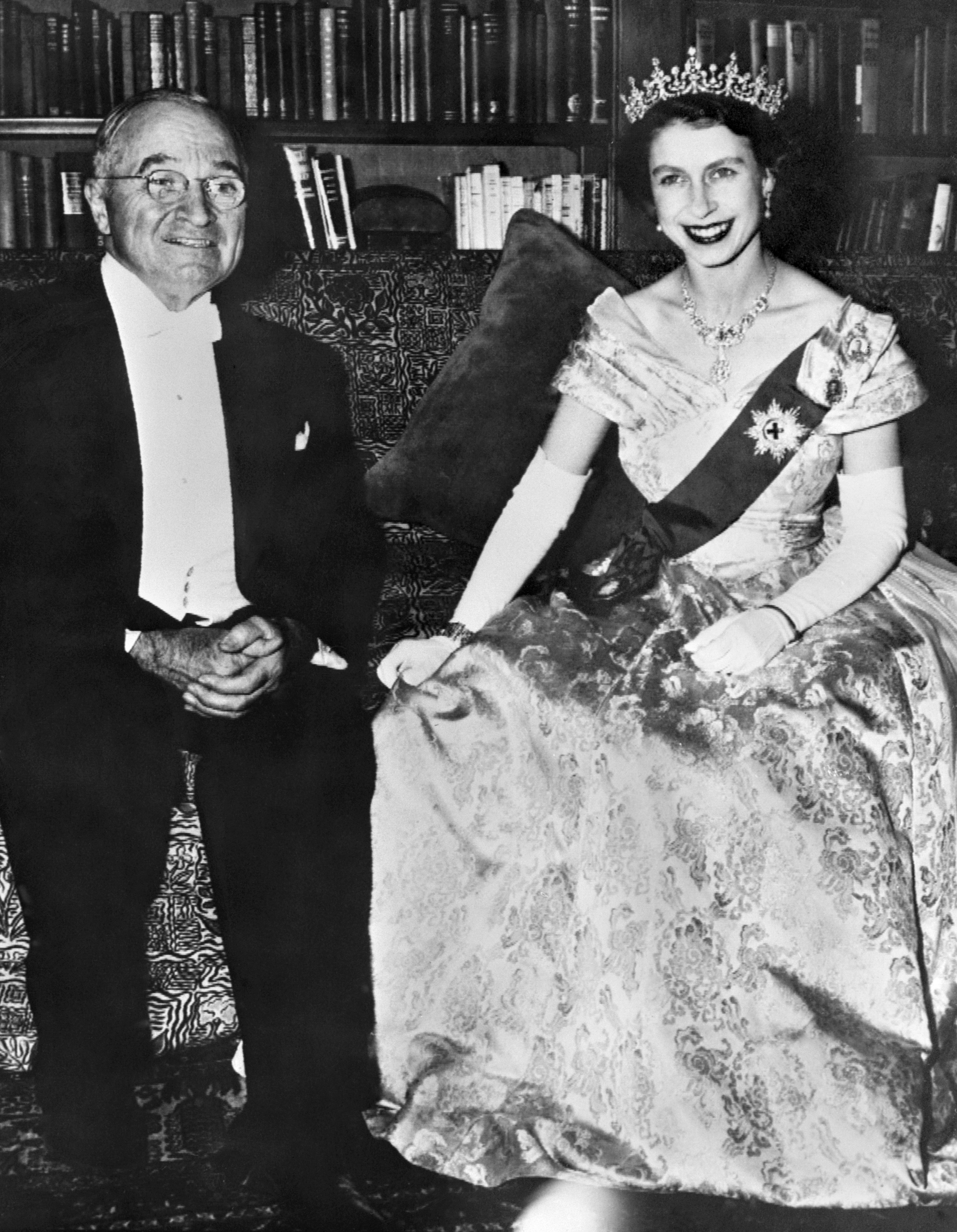 Then-Princess Elizabeth poses for a photo sitting next to American President Harry Truman in 1951