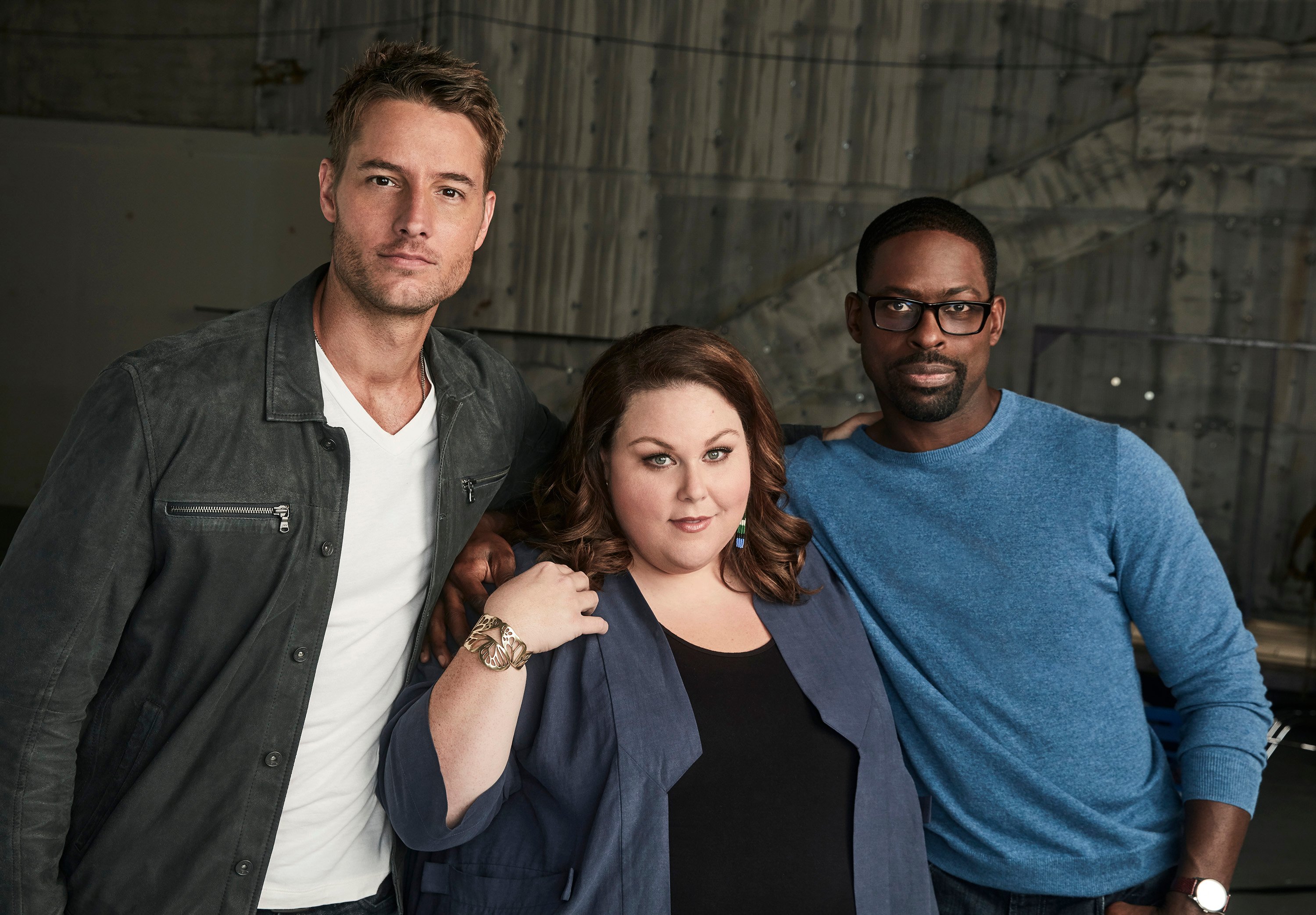'This Is Us': The Big Three, Justin Hartley as Kevin Pearson, Chrissy Metz as Kate Pearson and Sterling K. Brown as Randall Pearson hugging each other while staring at the camera.