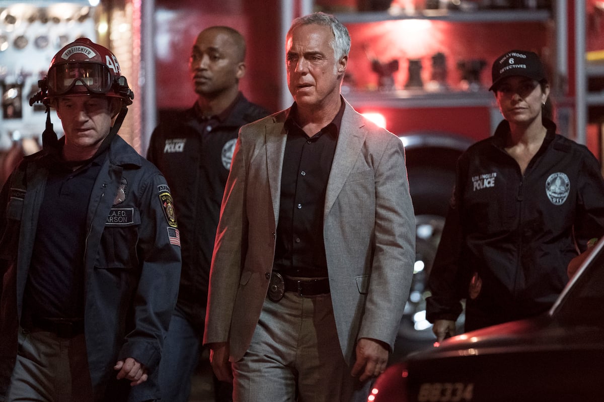 Harry Bosch surrounded by firefighters in episode of Bosch Season 7