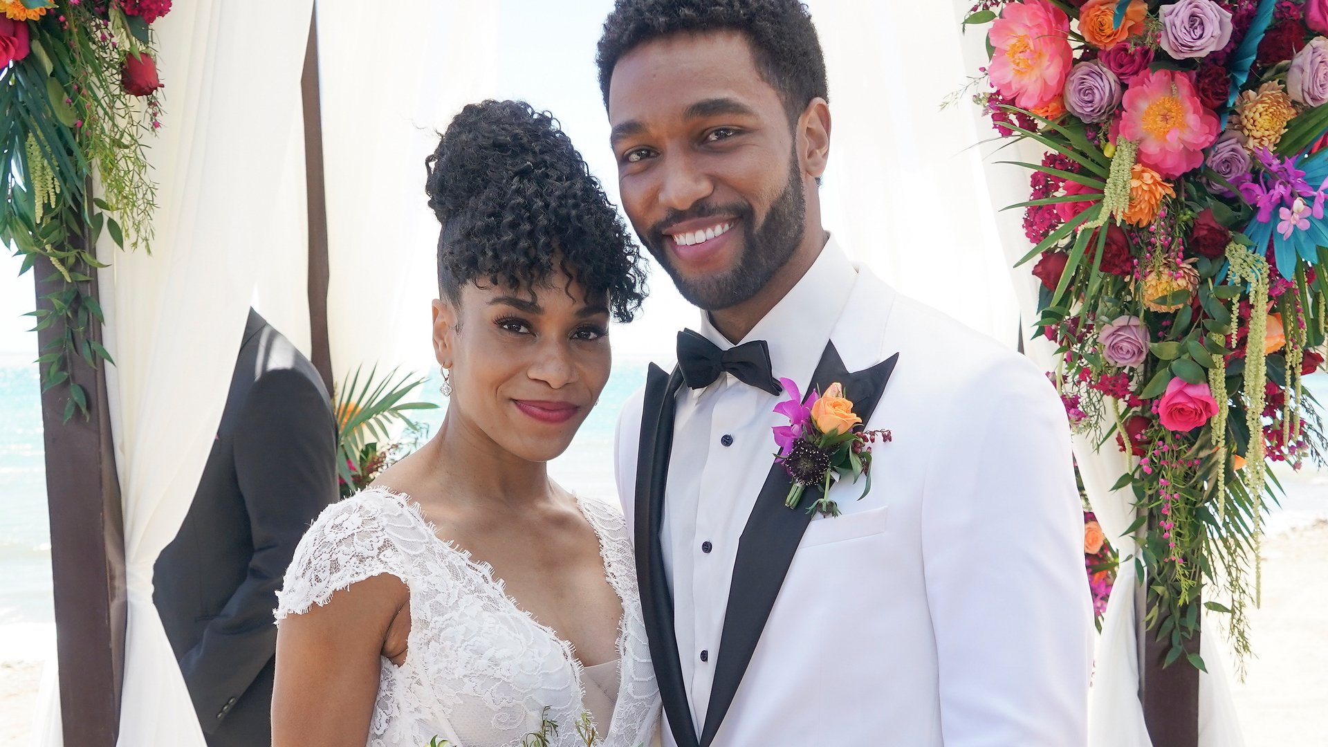 Kelly McCreary as Maggie and Anthony Hill as Winston getting married in the ‘Grey’s Anatomy’ Season 17 finale