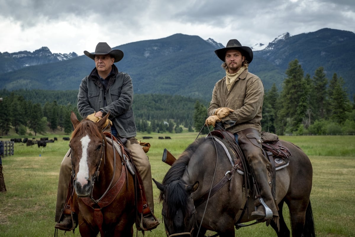 'Yellowstone' stars Kevin Costner (John Dutton) and Luke Grimes (Kayce Dutton) on horses in an image from season 3
