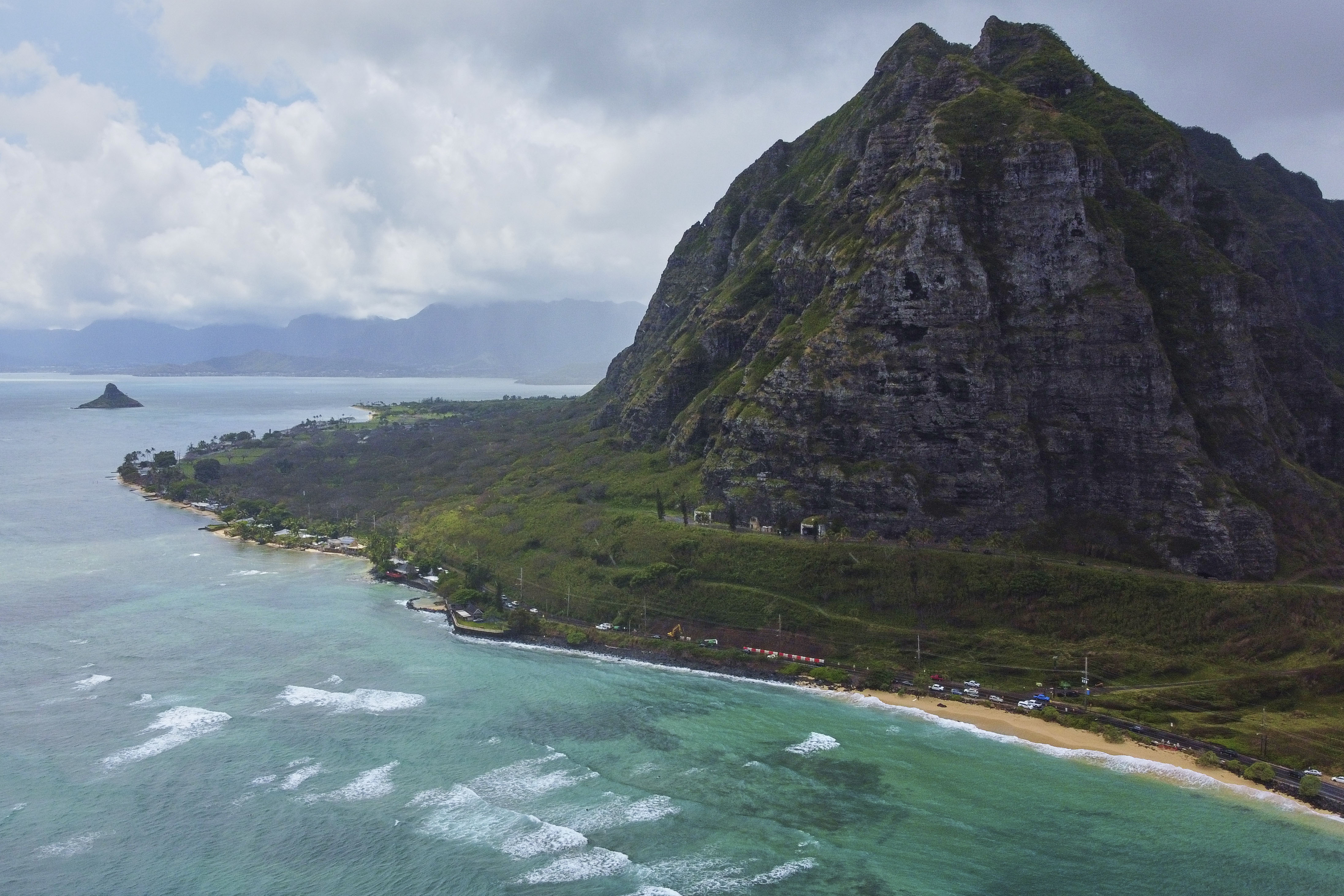 View of waves crashing on beach in Hawaii from You Had Me at Aloha
