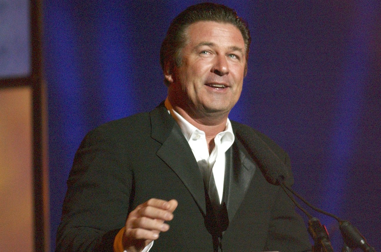 Alec Baldwin speaks on stage at a 2005 event.