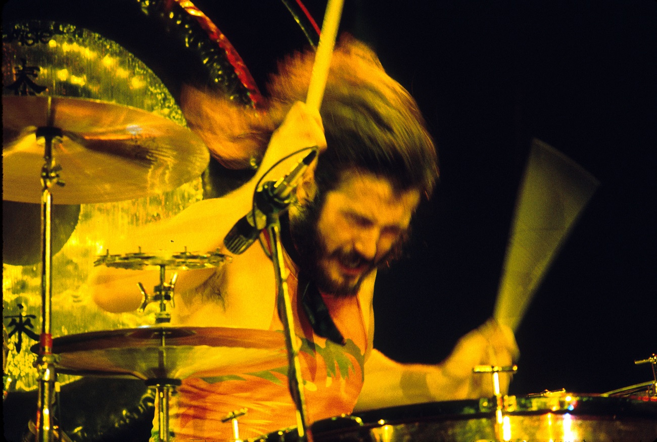 John Bonham playing drums on stage at a Led Zeppelin concert