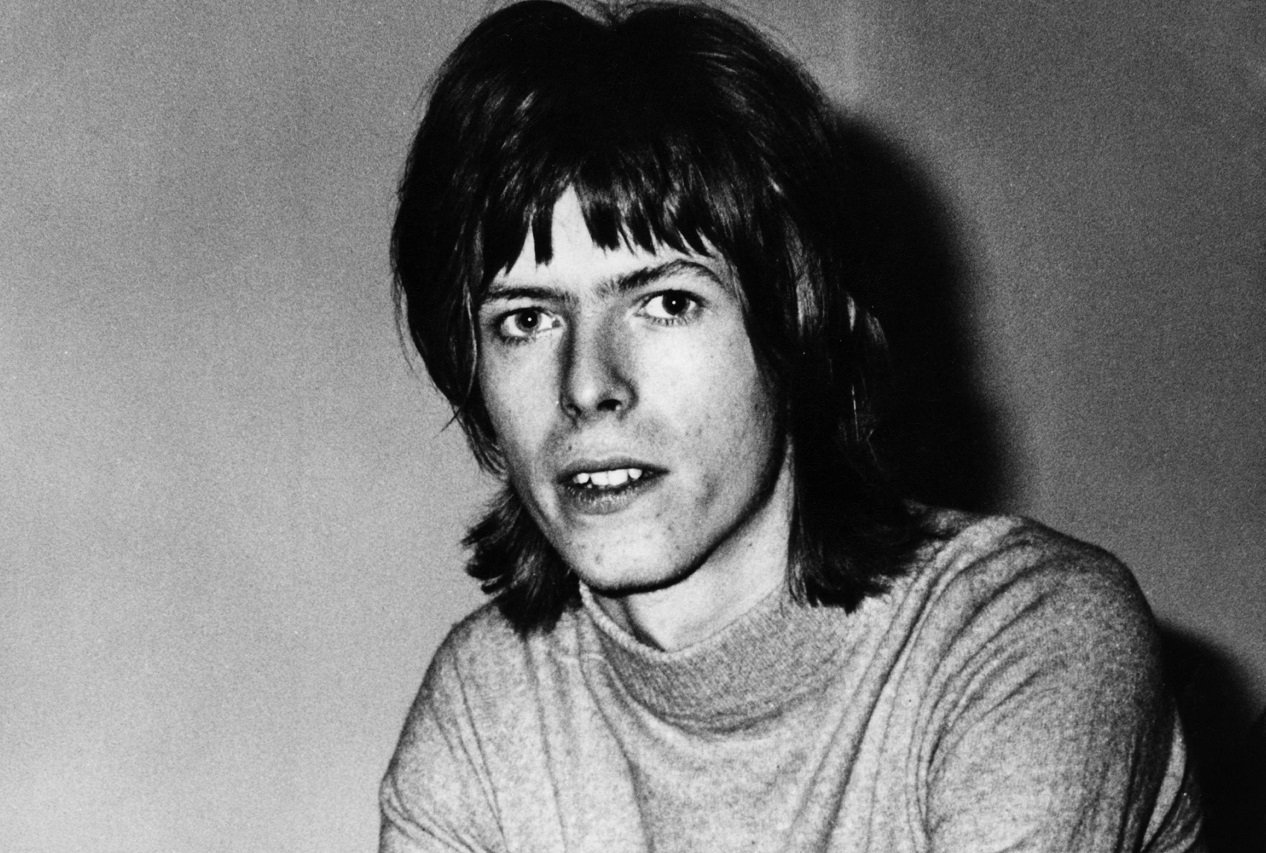 David Bowie gazes at the camera, mouth open, for a 1968 portrait