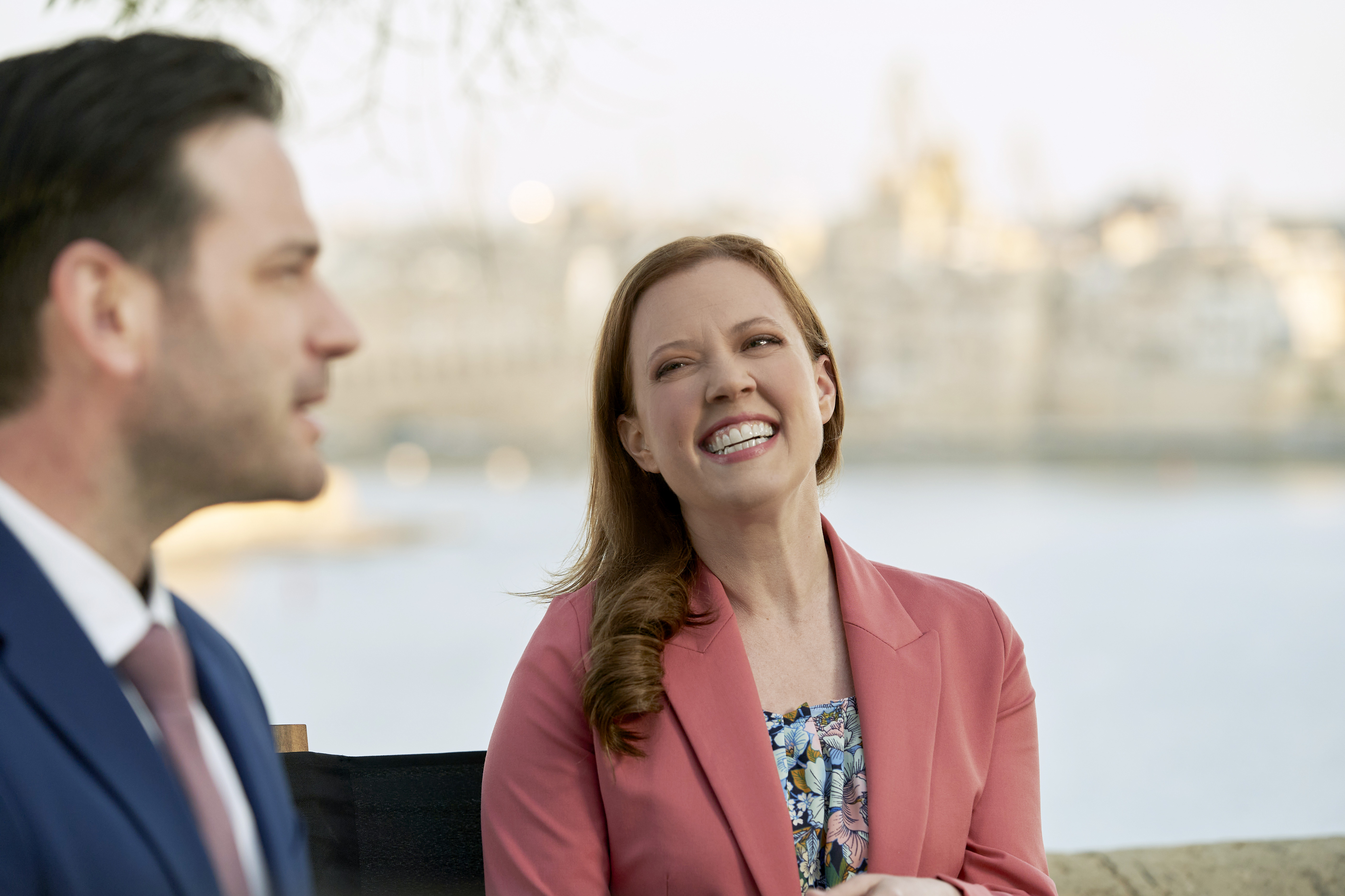 Smiling Patti Murin with Colin Donnell in profile in 'To Catch a Spy'