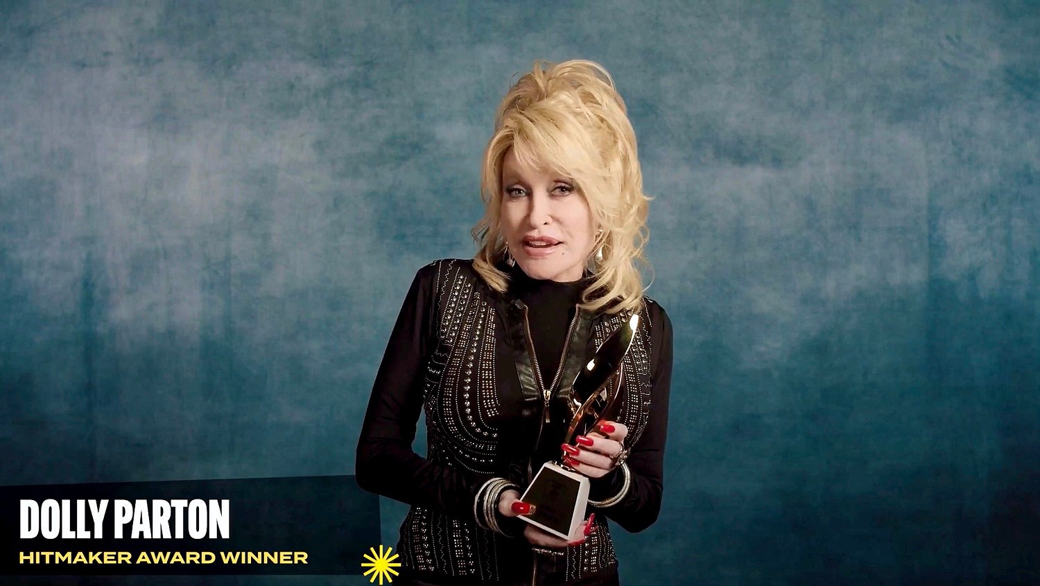 Dolly Parton accepts the Hitmaker Award during the Billboard Women In Music 2020 event on December 10, 2020.