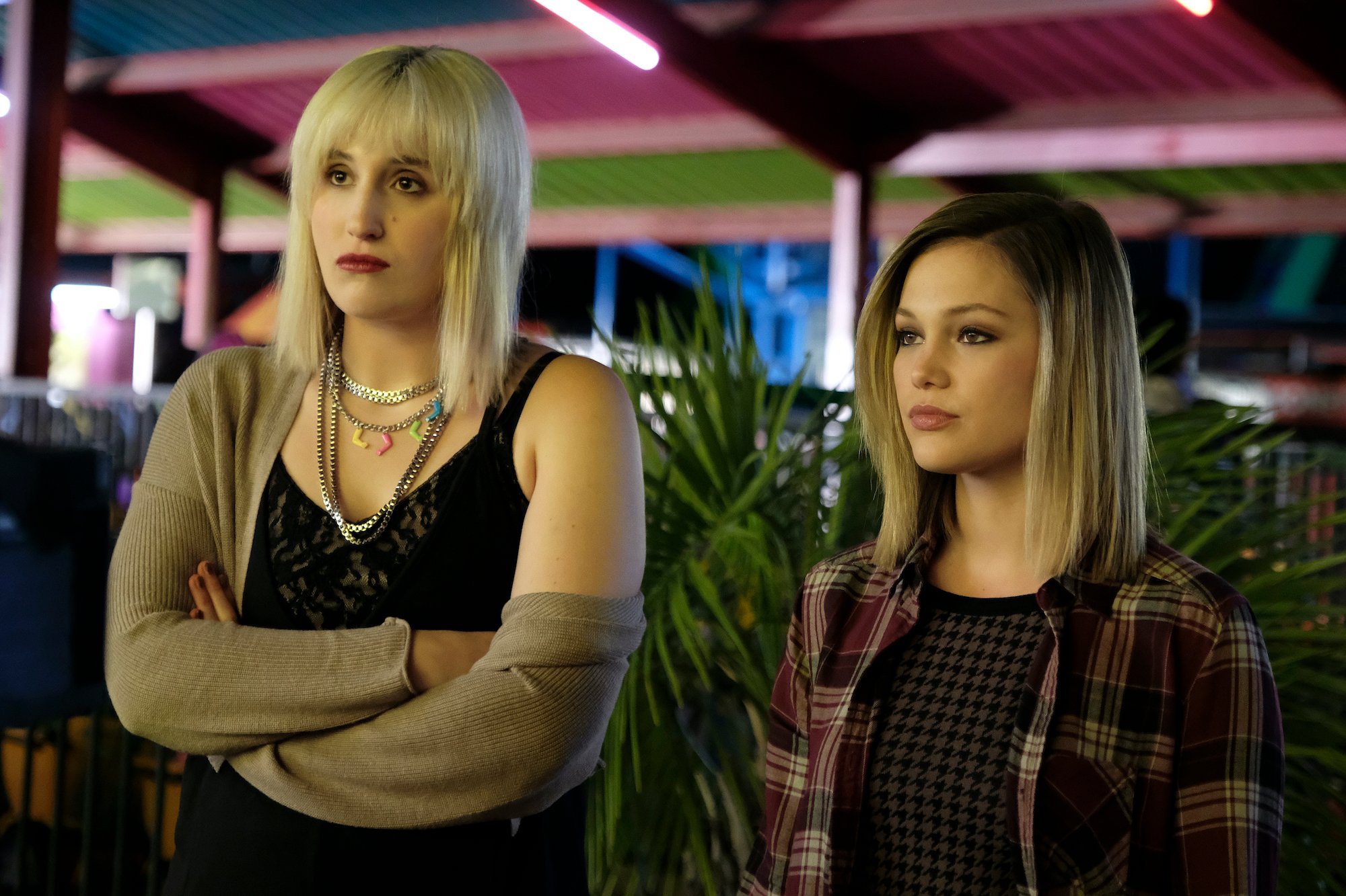 'CRUEL SUMMER' "As The Carny Gods Intended" Episode 5, Harley Quinn Smith as Mallory and Olivia Holt as Kate Wallis in 1995 at the carnival