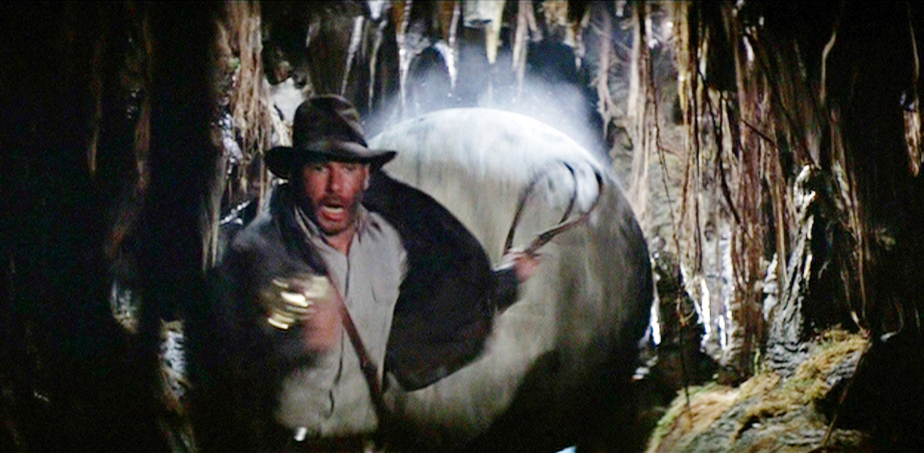 Harrison Ford as Indiana Jones running from a boulder in 'Raiders of the Lost Ark'