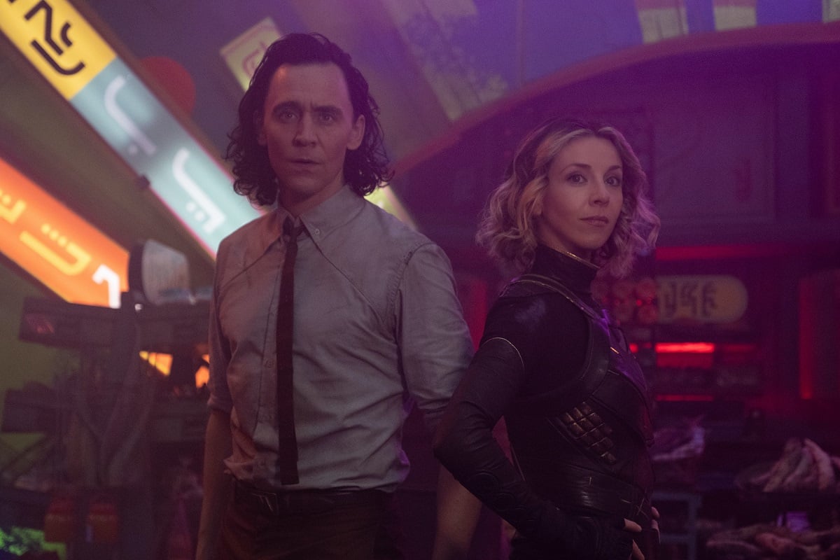 'Loki' stars Tom Hiddleston and Sophia Di Martin stand back to back on Lamentis-1