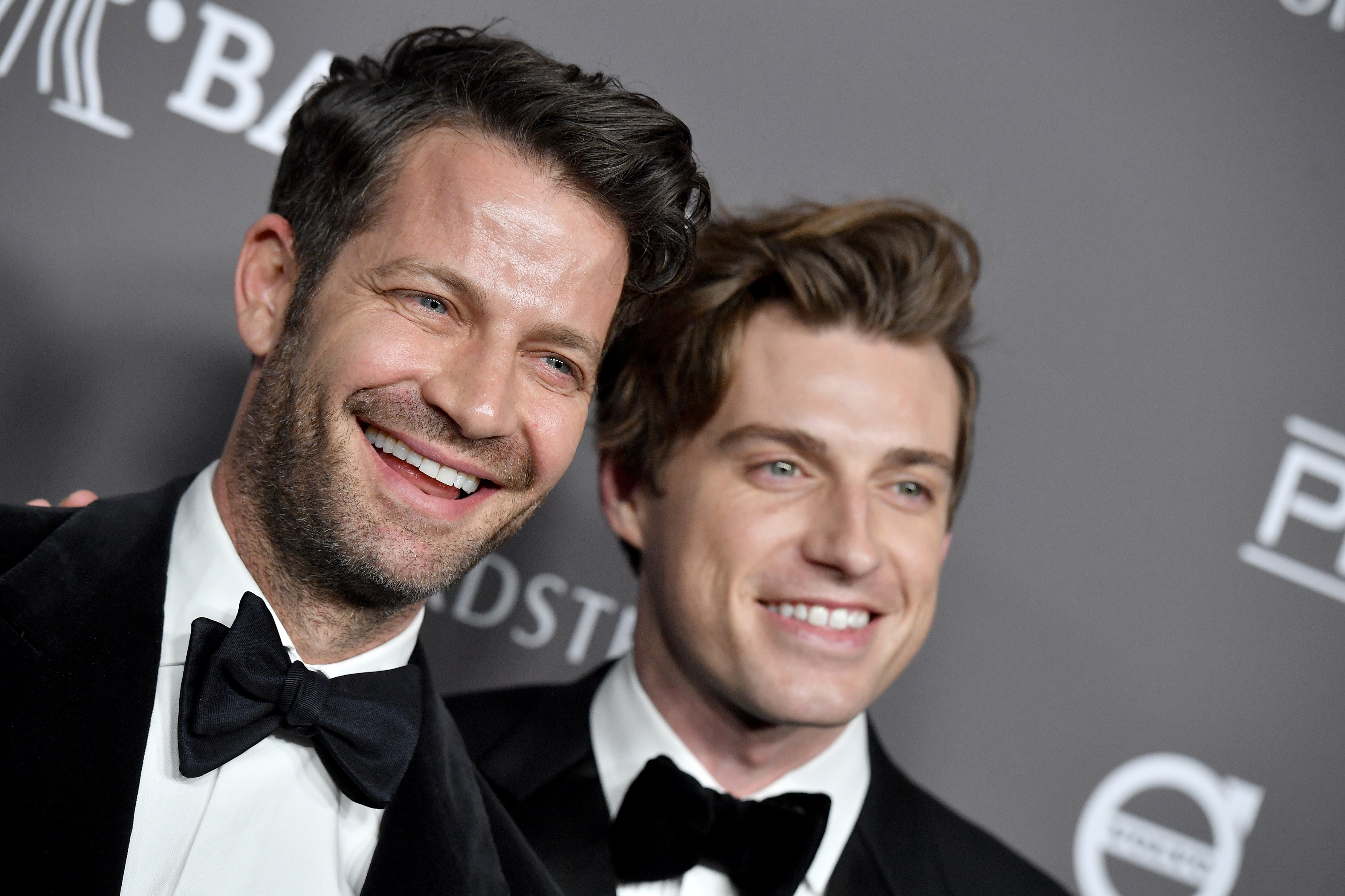 Nate Berkus and Jeremiah Brent, dressed in tuxedos, at an event in 2018