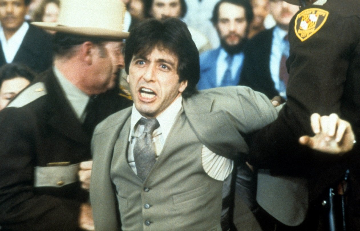 Al Pacino grimaces as bailiffs remove him from the courtroom in 'And Justice for All.'