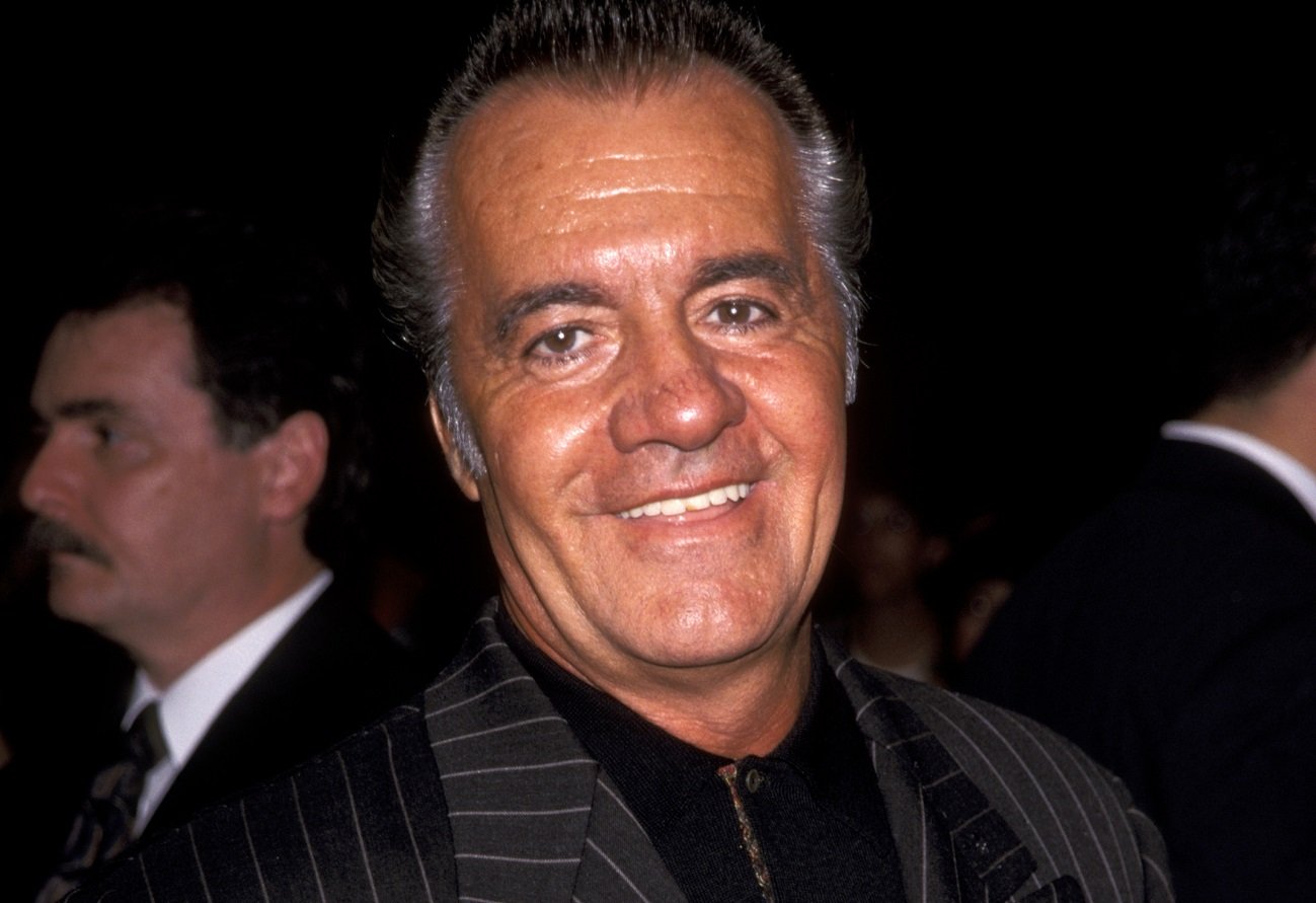 Tony Sirico smiles for the camera at a movie premiere.