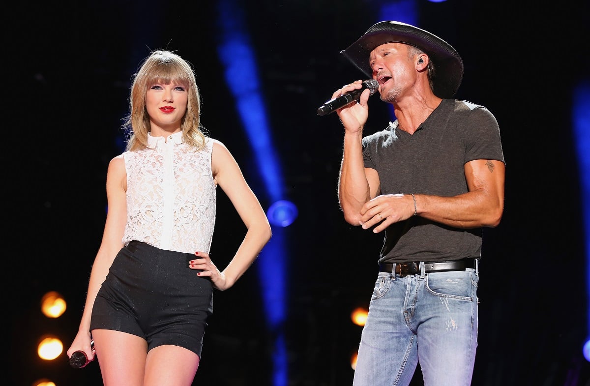 Taylor Swift (L) and Tim McGraw perform during the 2013 CMA Music Festival on June 6, 2013, in Nashville, Tennessee.