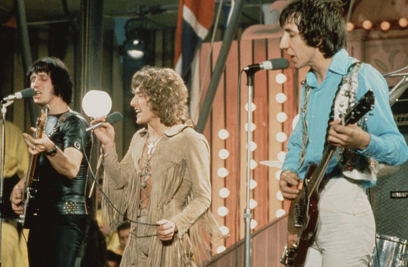 John Entwistle, Roger Daltrey, and Pete Townshend sing and play their instruments onstage in 1968.