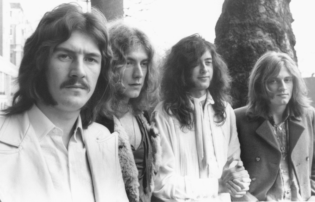 Led Zeppelin posed for a band photo outdoors, circa 1971
