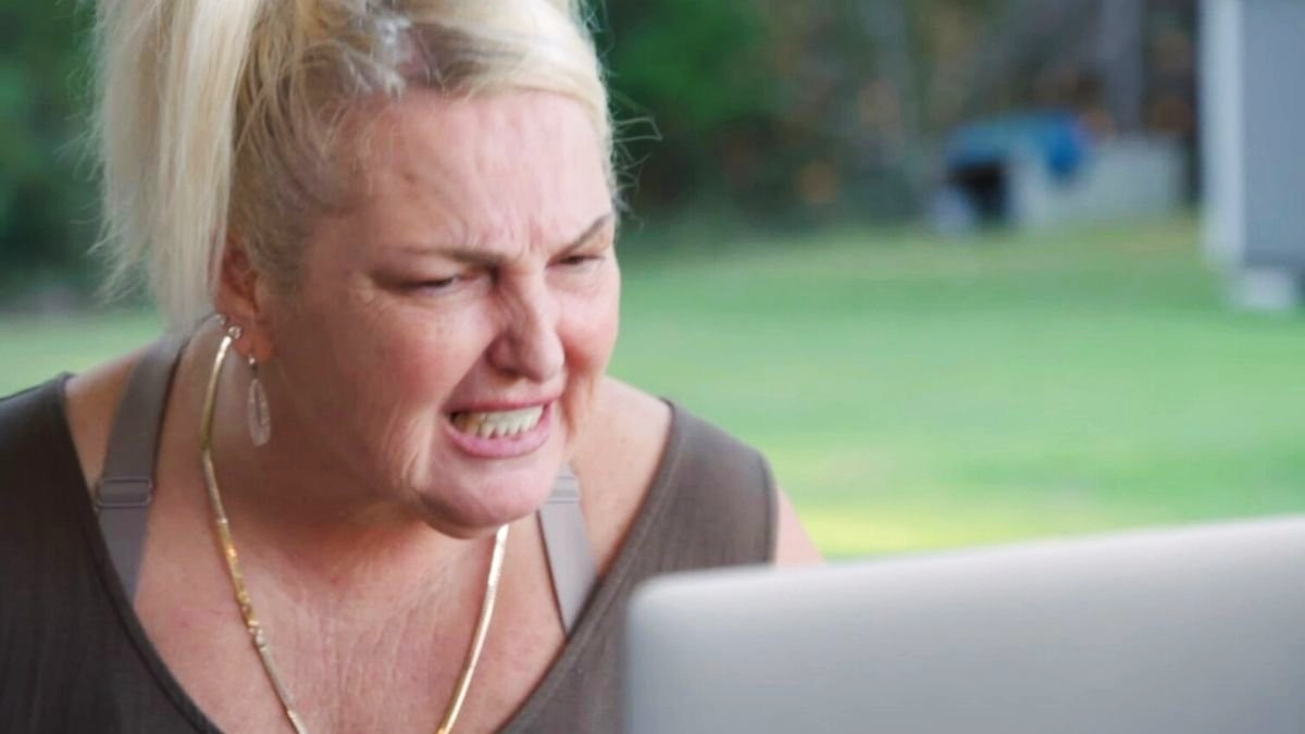 Angela Deem yelling at her computer on 90 Day Fiancé