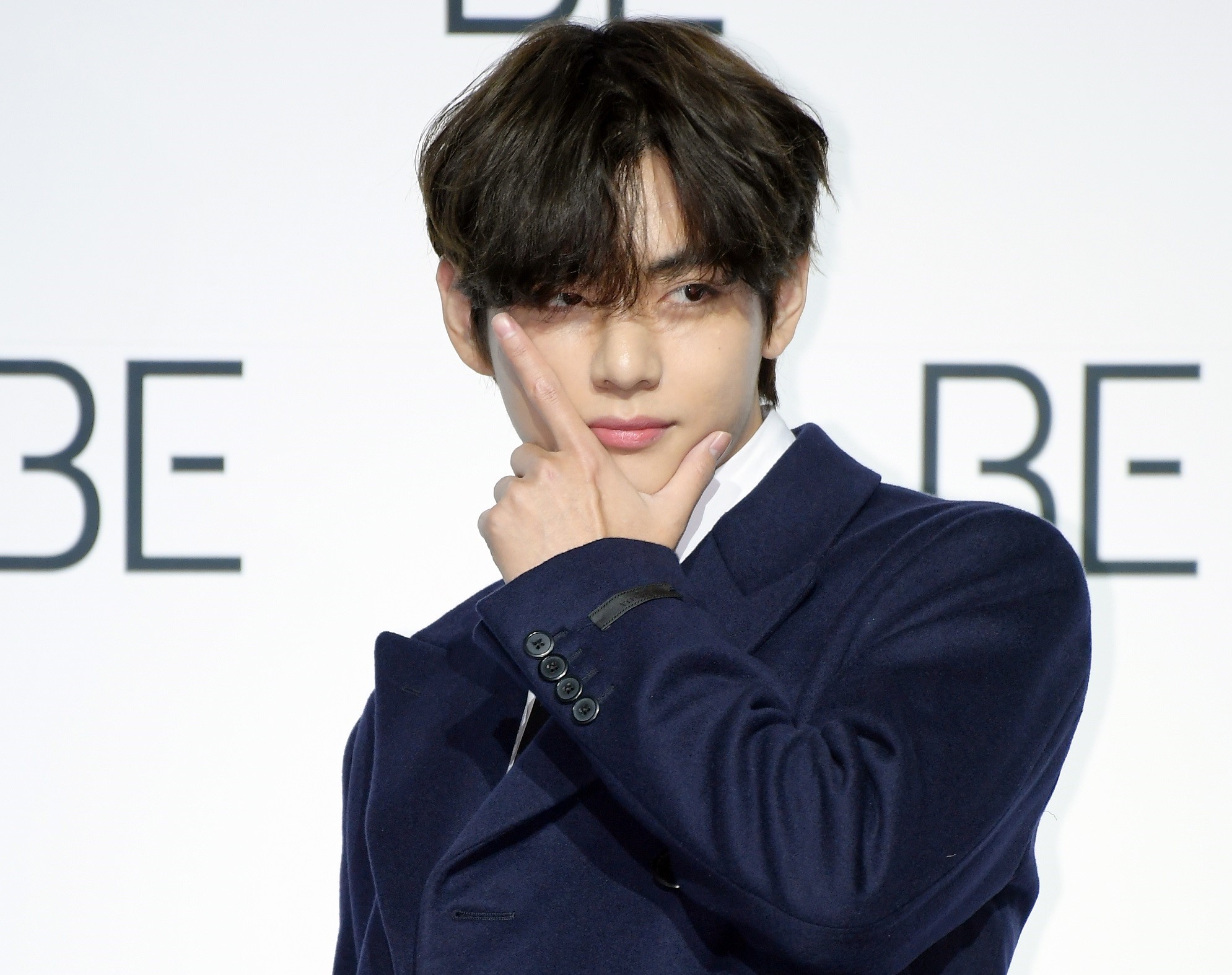 V of BTS poses at BTS' press conference for 'BE' in November 2020