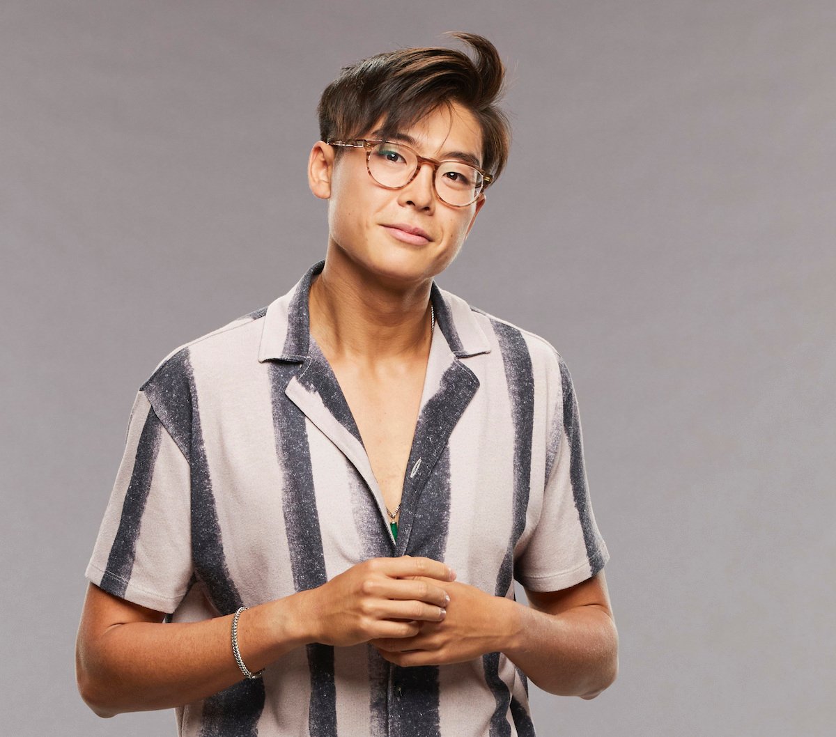 Derek Xiao of 'Big Brother 23' poses in a stripped shirt
