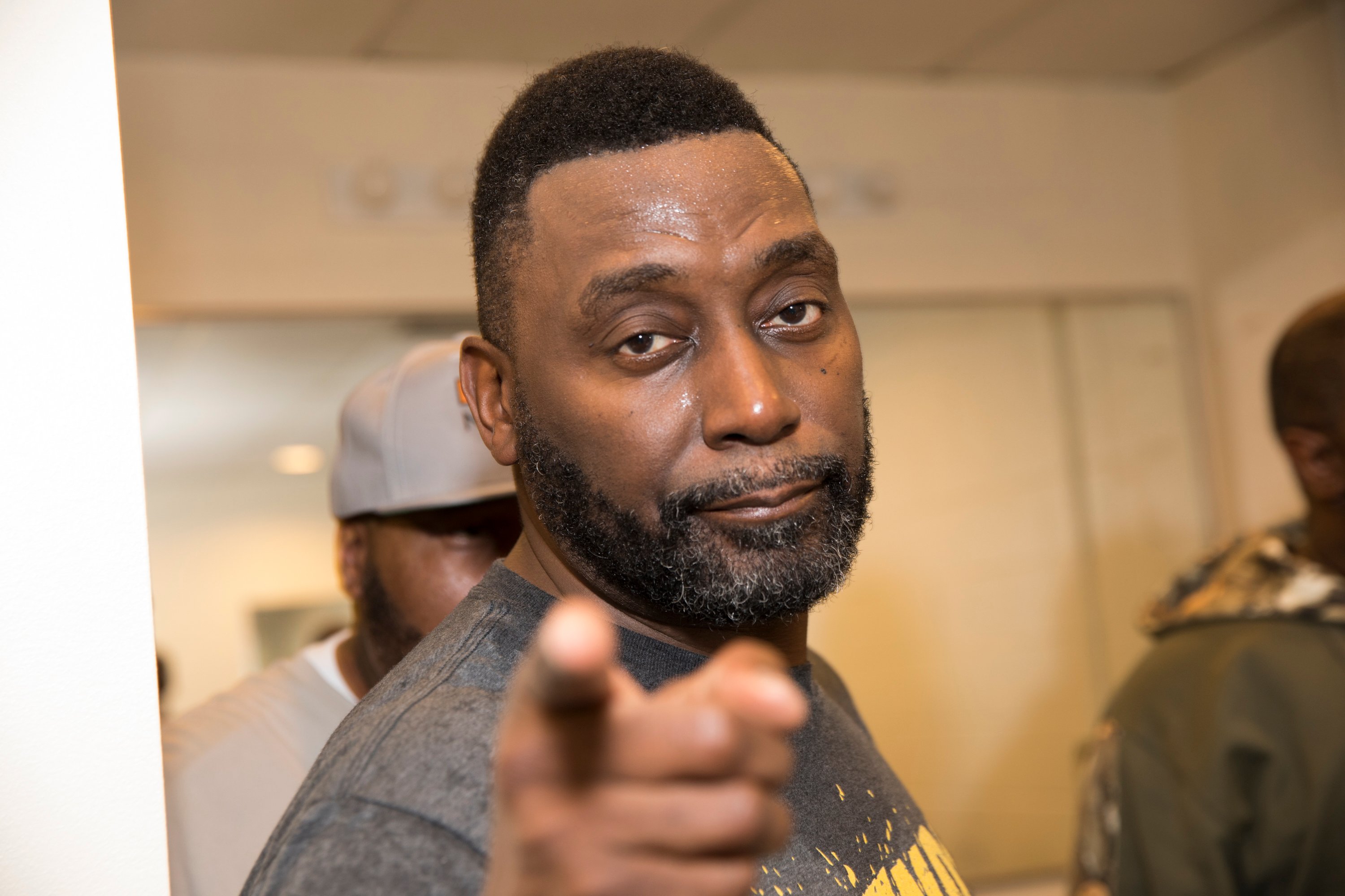 Big Daddy Kane pointing at the camera