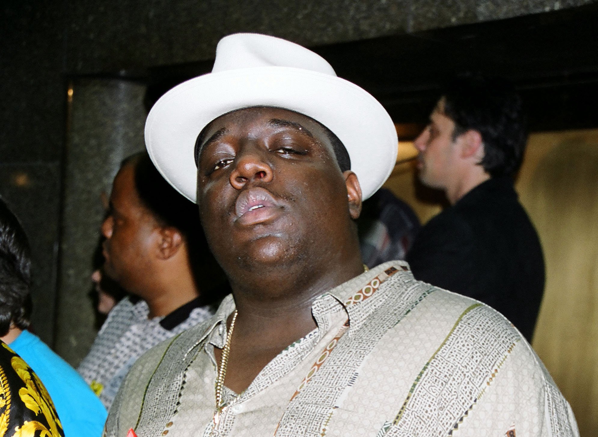 The Notorius B.I.G. wearing a hat