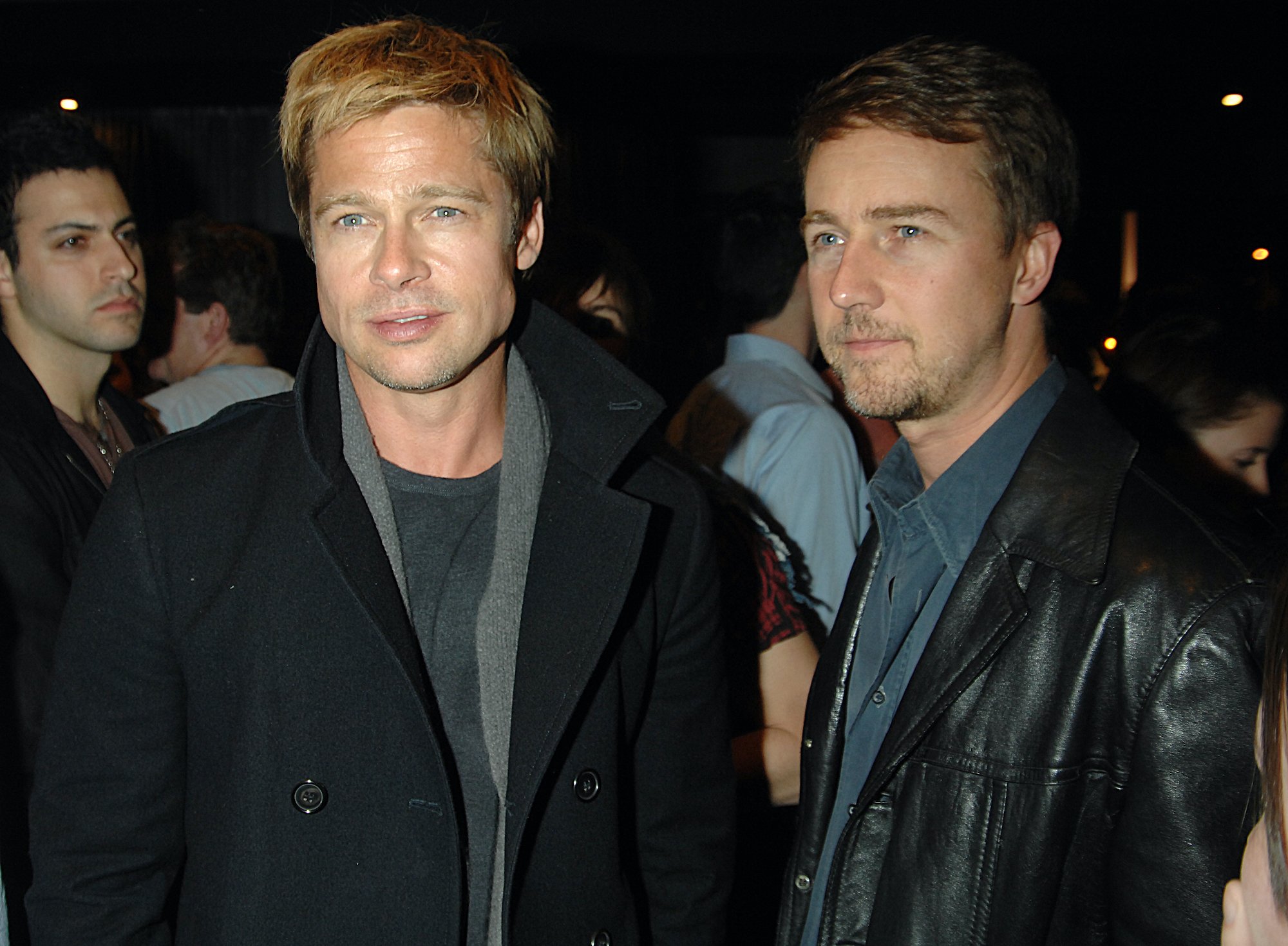 Brad Pitt and Edward Norton, stars of 'Fight Club', standing in a crowd