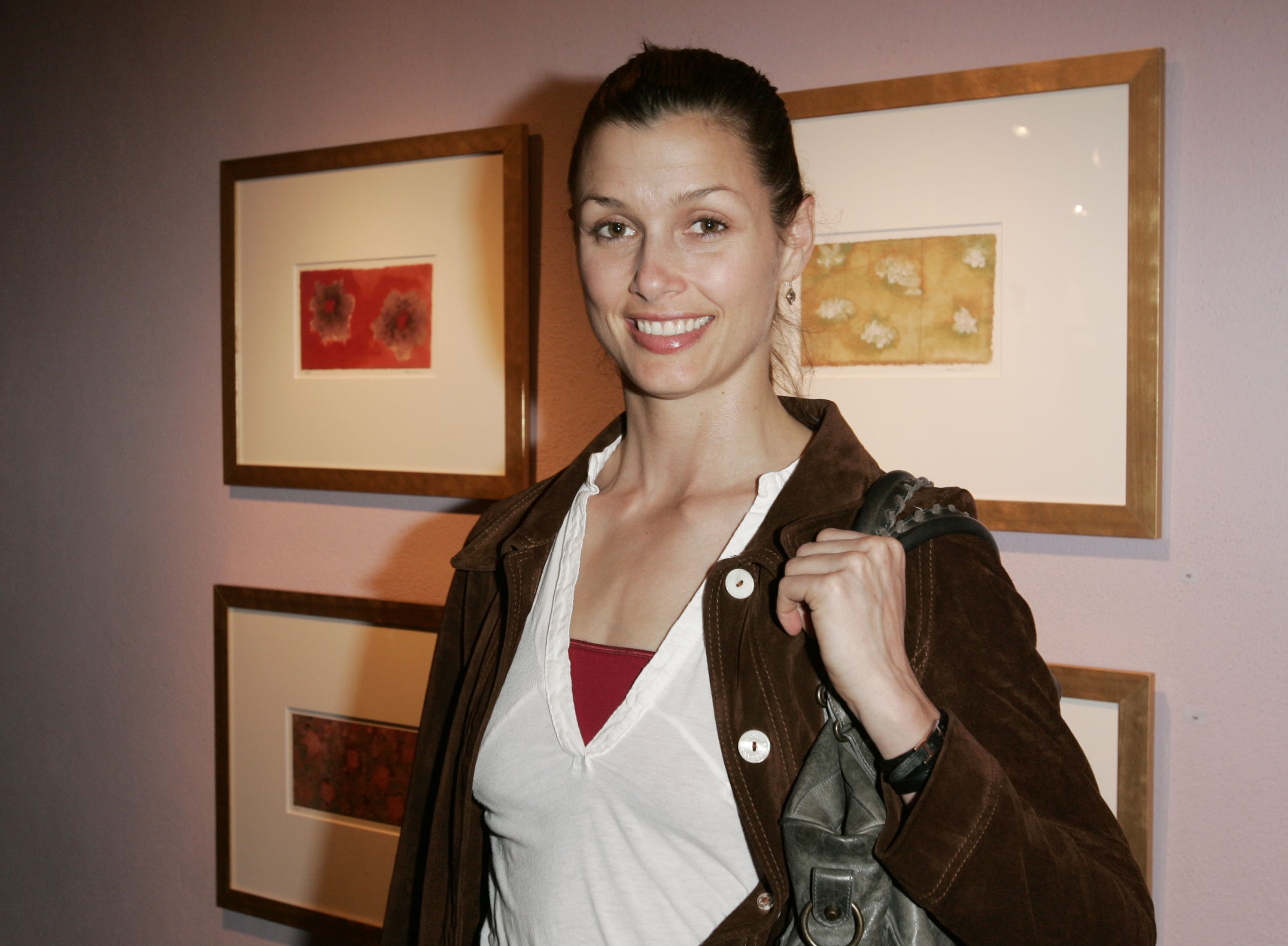 Bridget Moynahan poses for a photo at the opening of 8 Gallery 