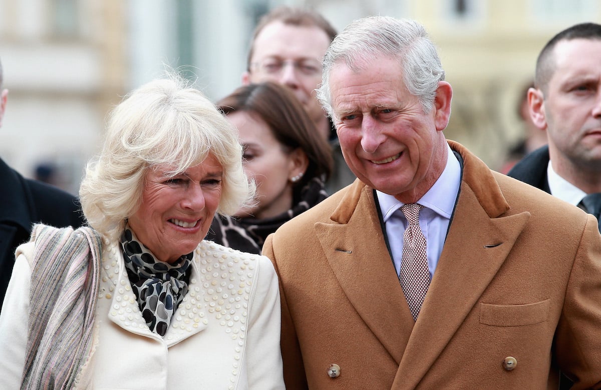 Camilla Parker Bowles and Prince Charles smile as they arrive in Croatia