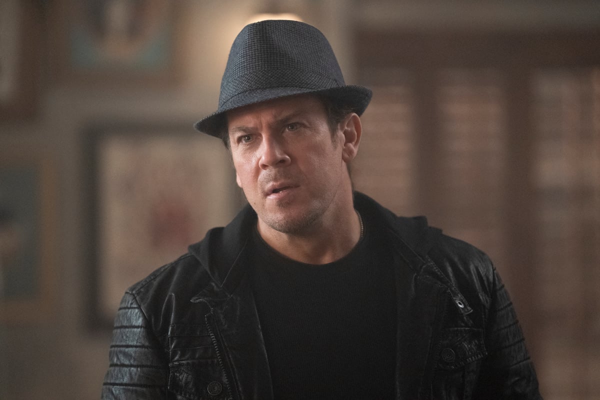 Christian Kane, wearing a hat, in 'Leverage: Redemption'