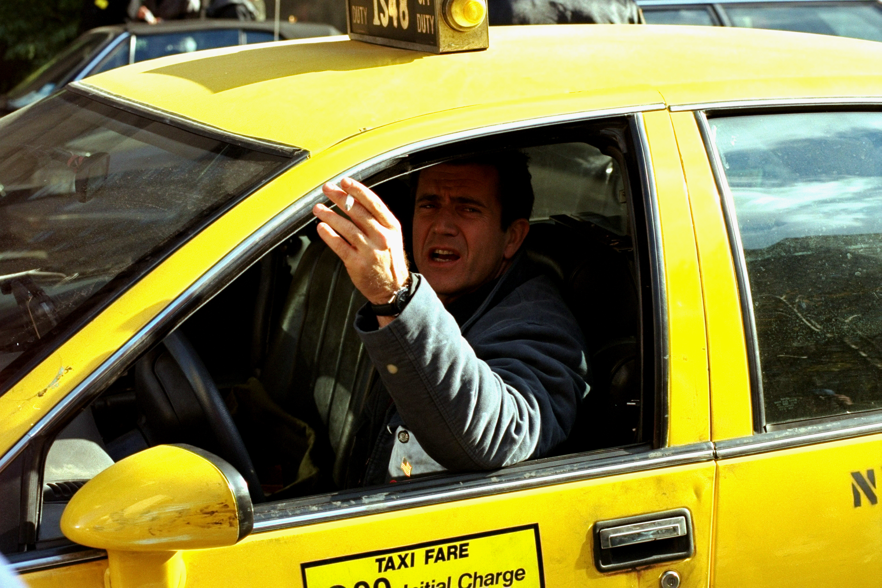 Conspiracy Theory: Mel Gibson drives a cab