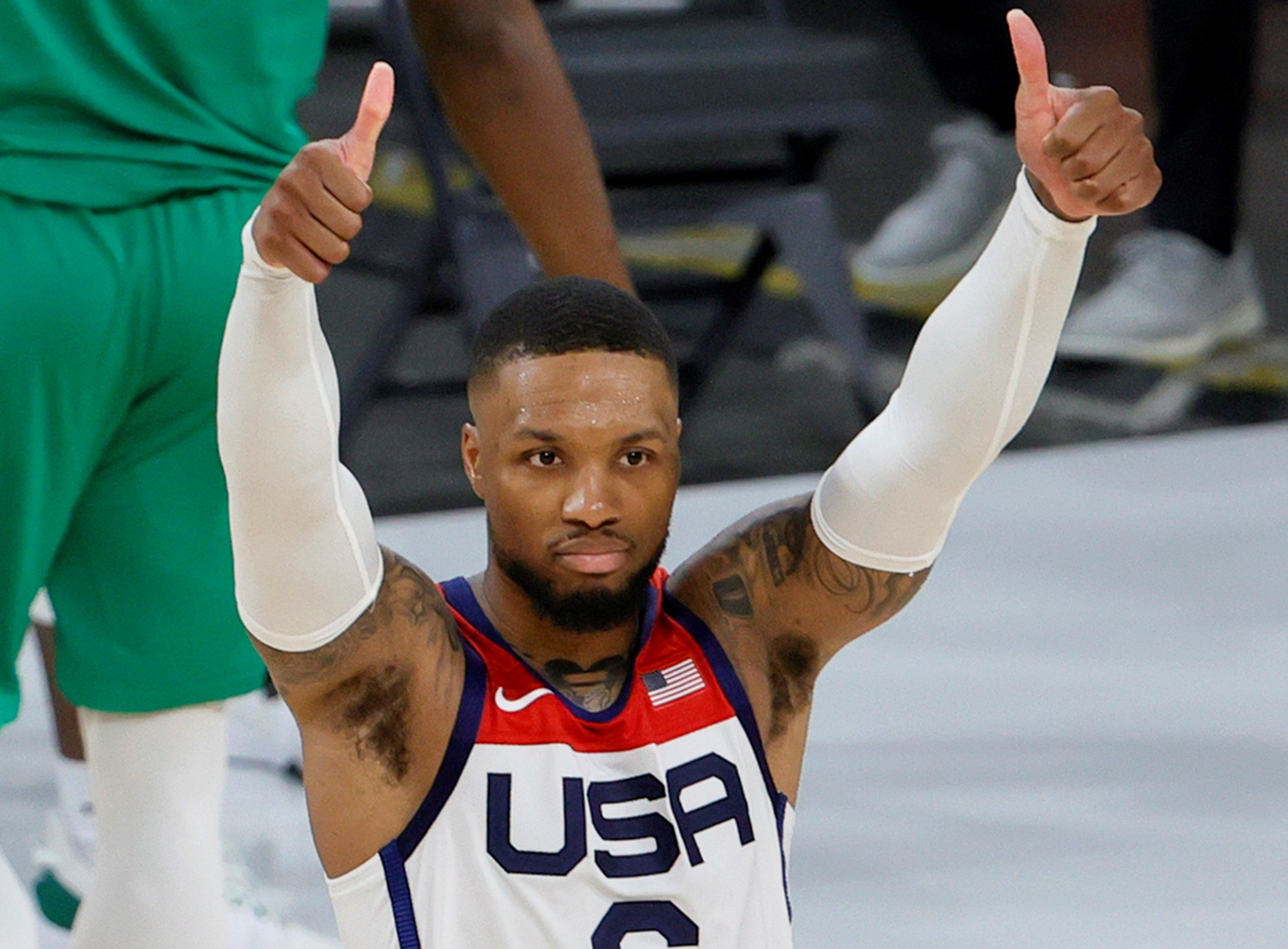 Damian Lillard asks for a jump ball call during a Team USA exhibition game