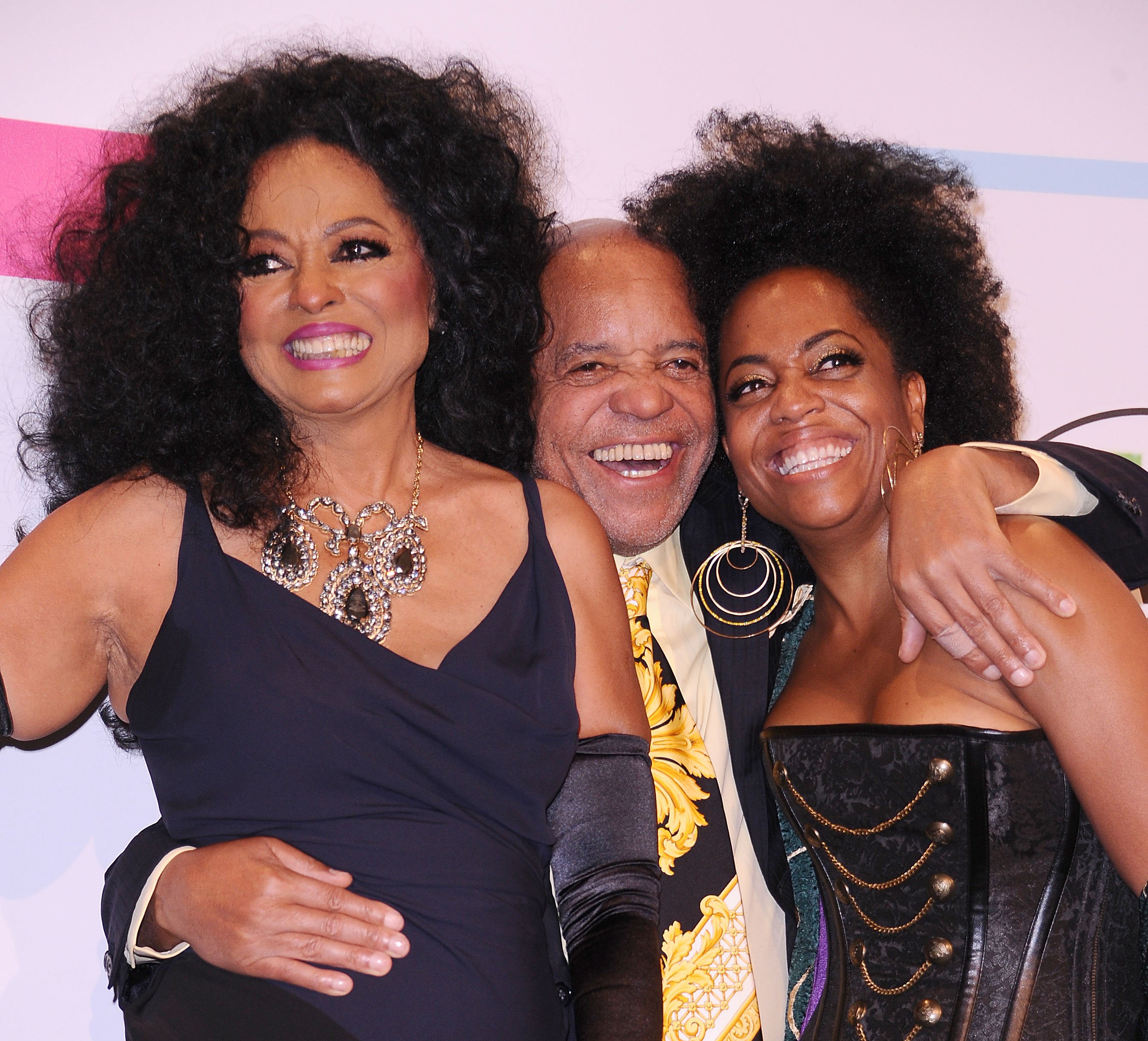 (L-R): Diana Ross, Berry Gordy, and Rhonda Ross Kendrick smiling at a premiere.