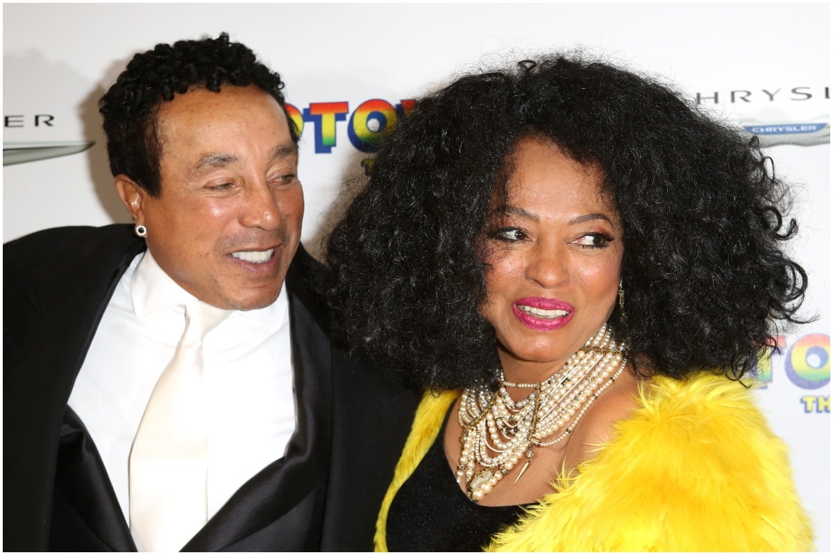 Diana Ross and Smokey Robinson smiling while attending 'Motown: The Musical.'