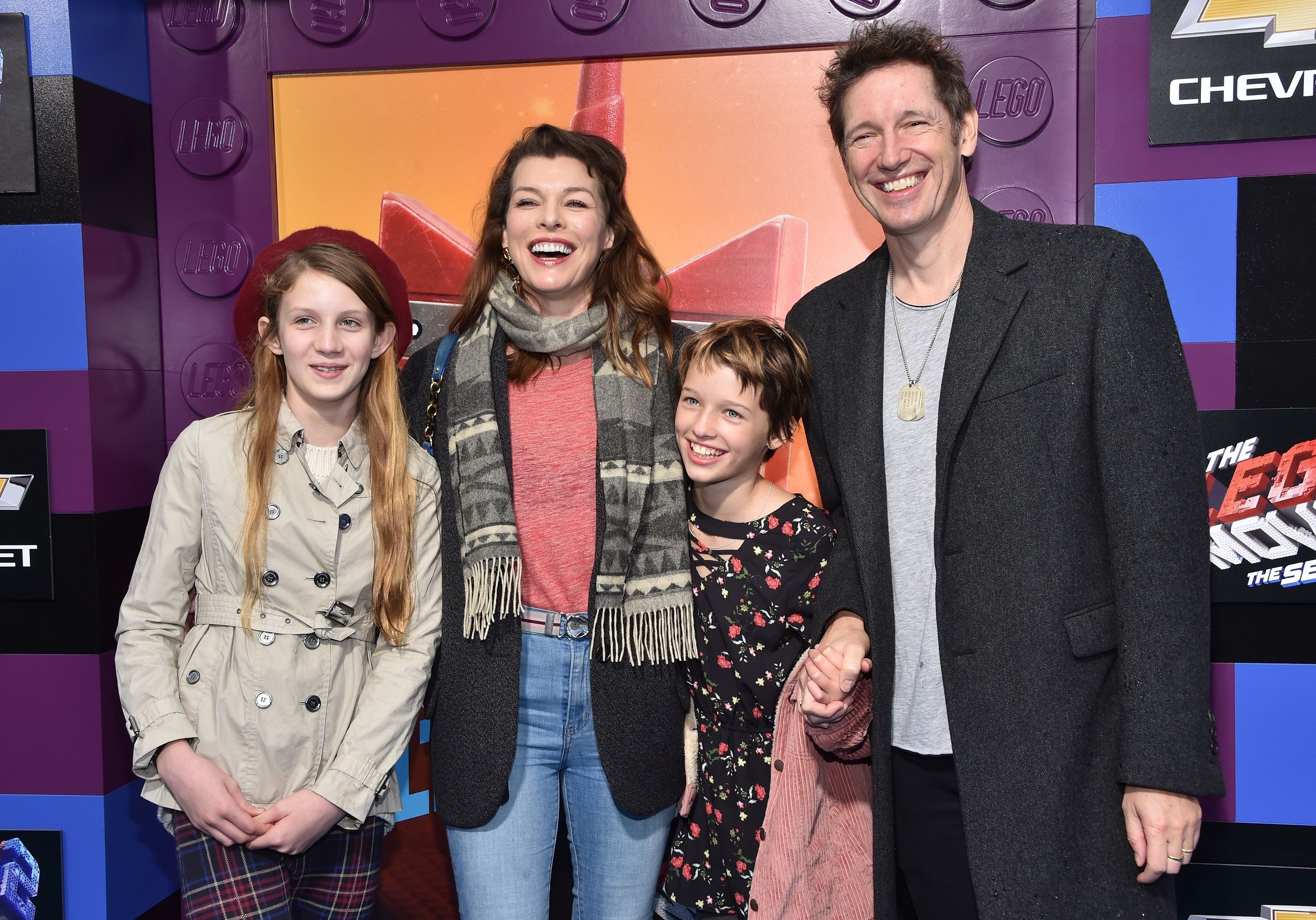 Milla Jovovich, Paul W. S. Anderson and children, Ever Gabo Anderson and Dashiel Edan Anderson posing for photographers at the premiere of Lego Movie 2