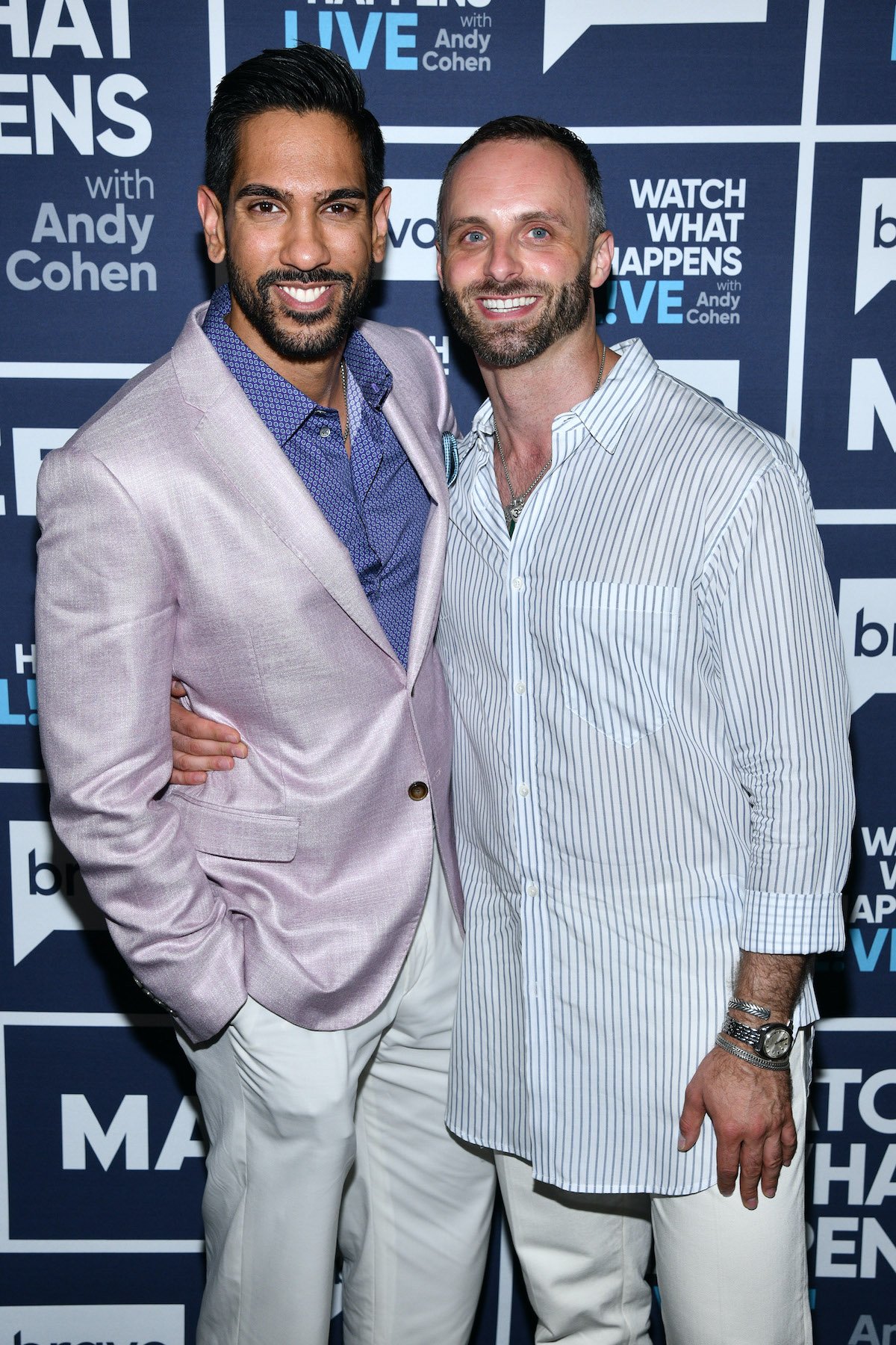 Amrit Kapai and Nicholas Kouchoukos from Family Karma on WWHL