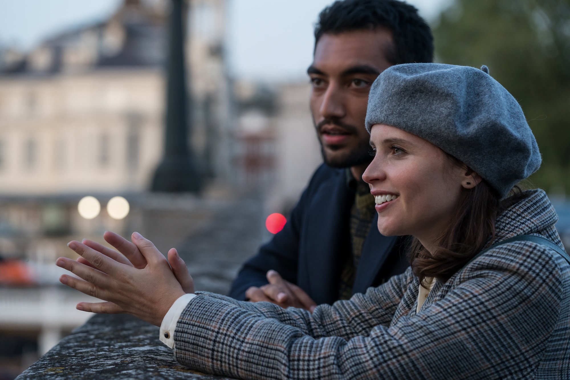 Felicity Jones and Nabhaan Rizwan look out over London