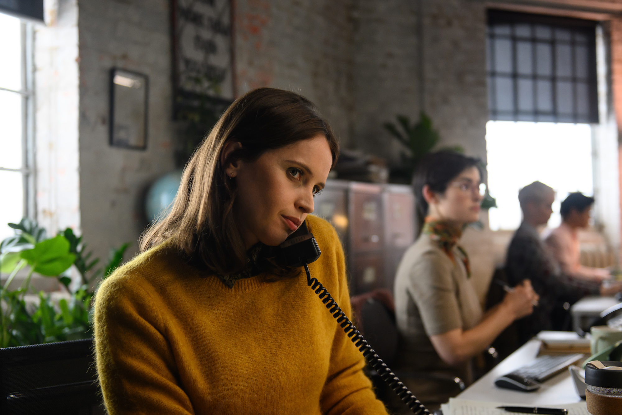 Felicity Jones on the phone