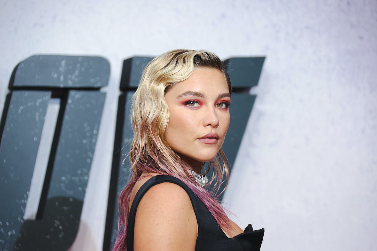 Florence Pugh wears black and poses at the ‘Black Widow’ UK premiere