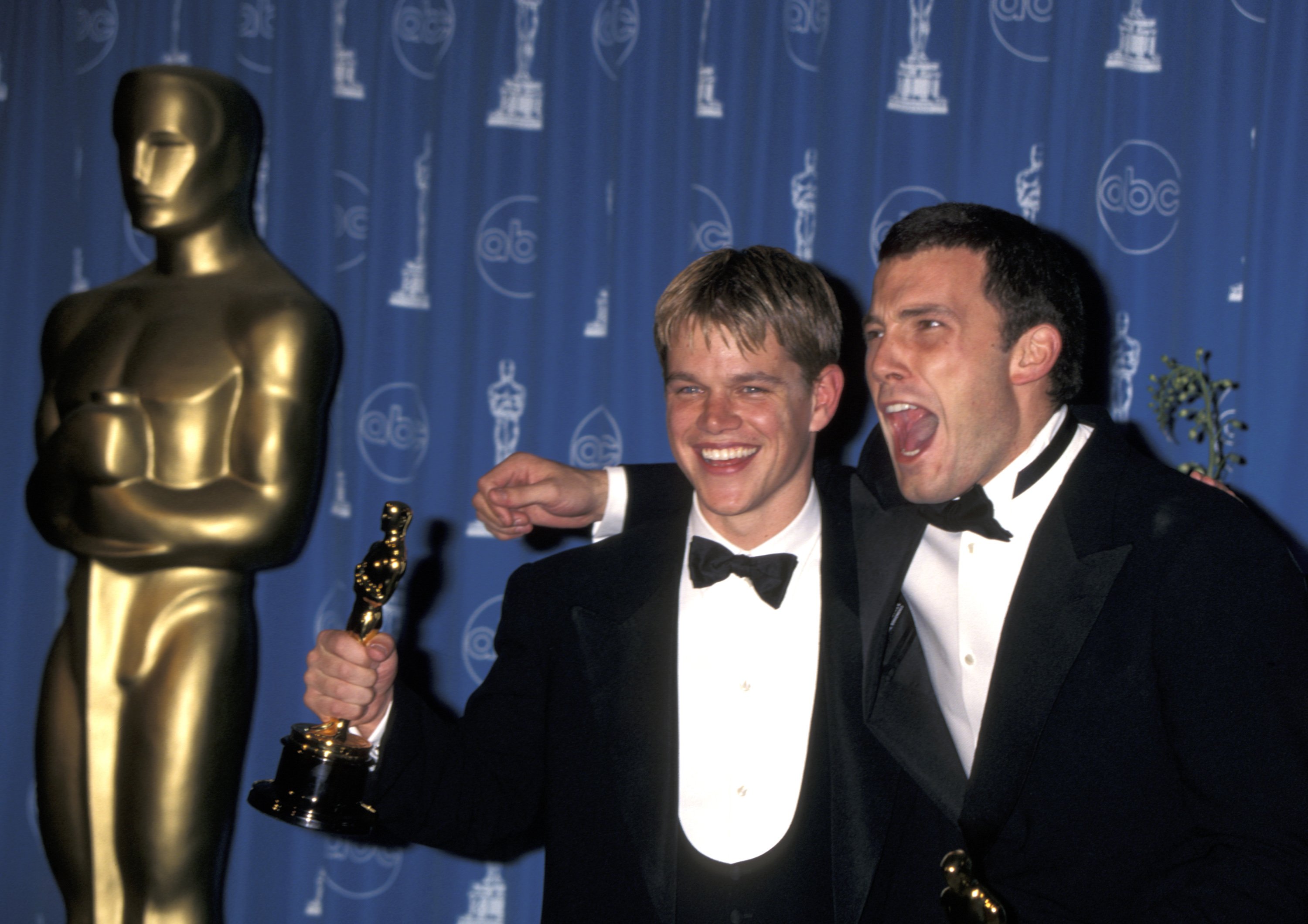 Good Will Hunting Oscar winners Matt Damon and Ben Affleck hold their Oscar backstage